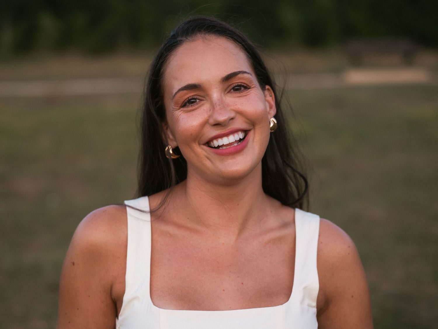 candid of woman laughing at camera