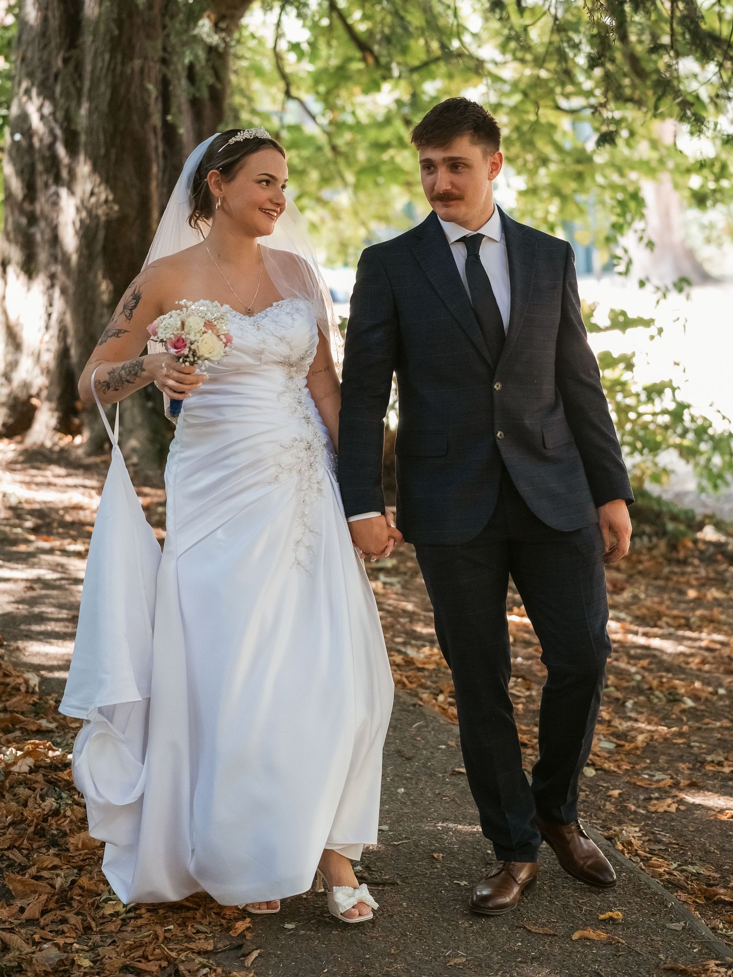 Bride and groom portrait walking