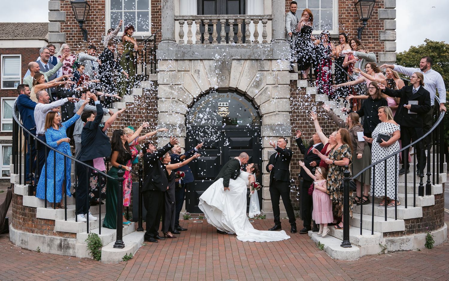 Confetti shot outside the spiral staircase at Poole registry office