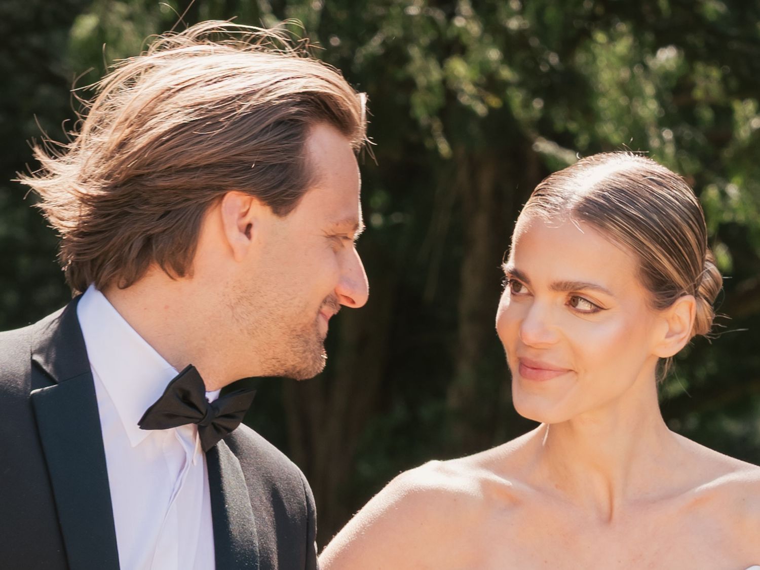 Bride and groom exchange looks