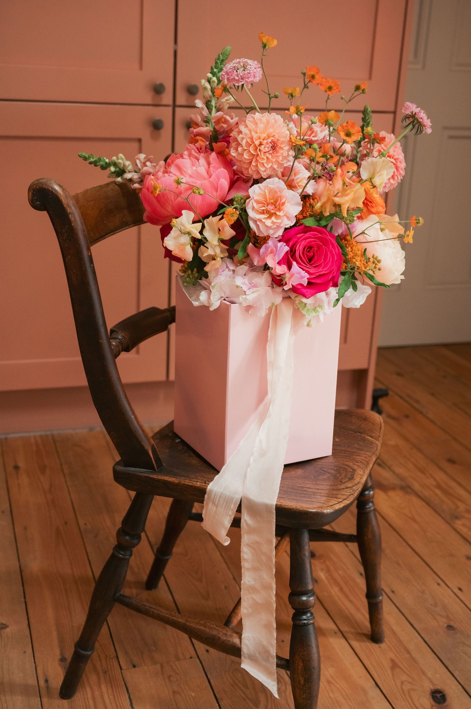 Colourful spring bouquet on chair