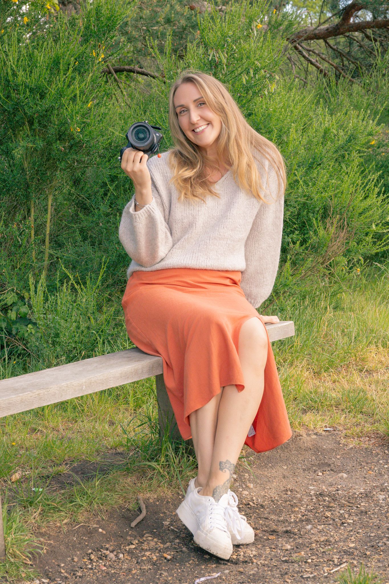 Photo of myself holding my camera