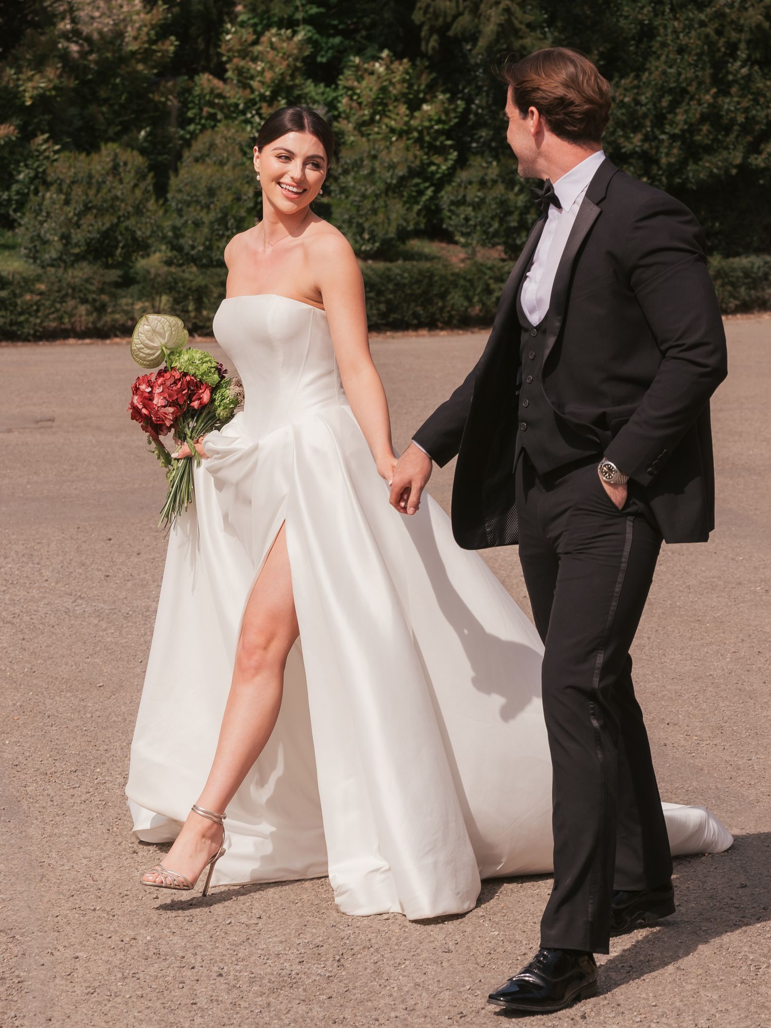 Newly wed couple walking