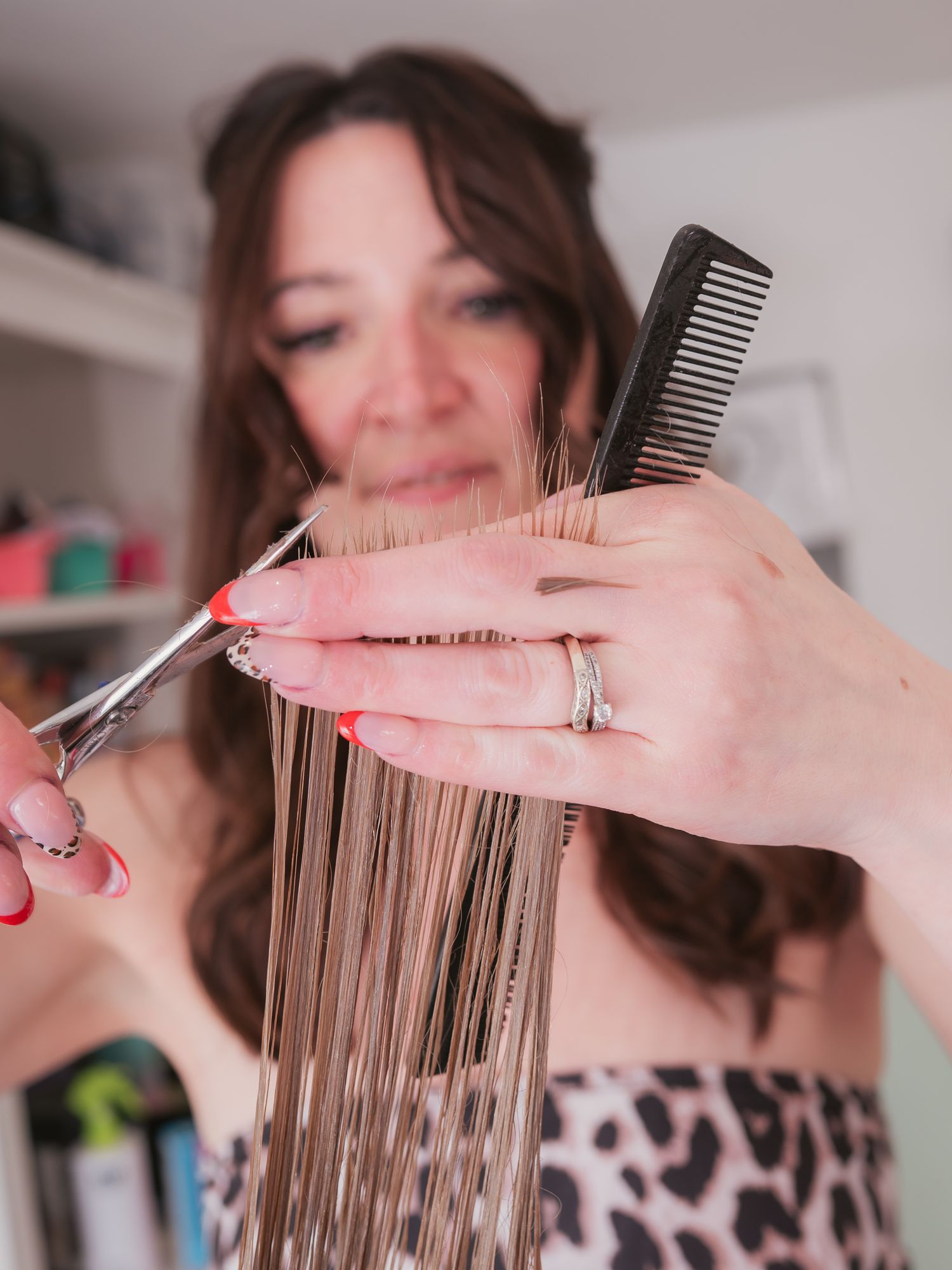 Hairdresser cutting hair