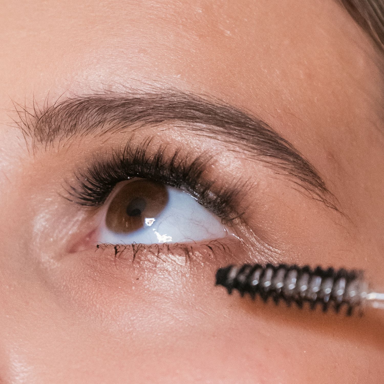 Close up of eye make up application for branding photography