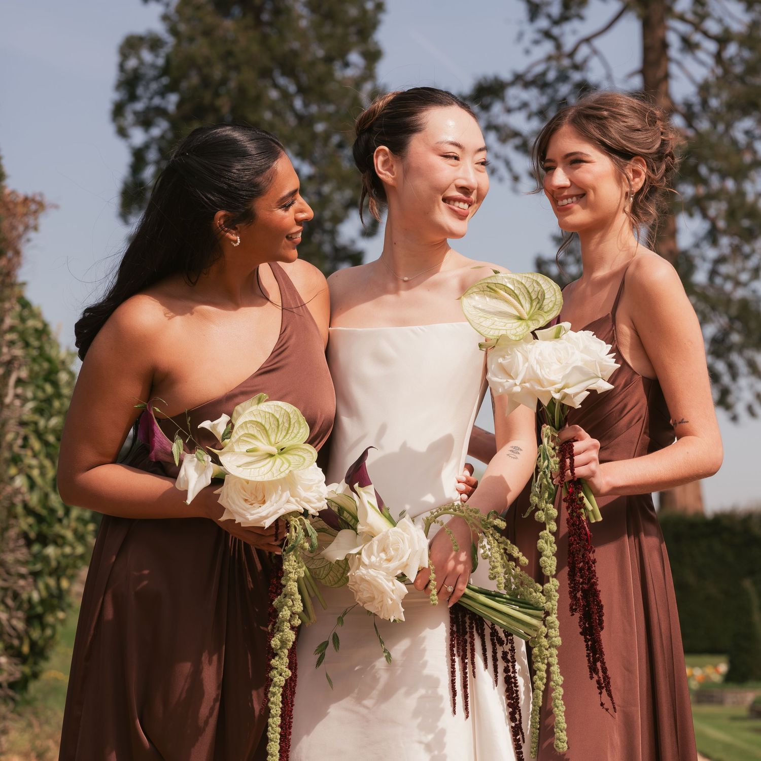 Bride and her bridesmaids on a hot day