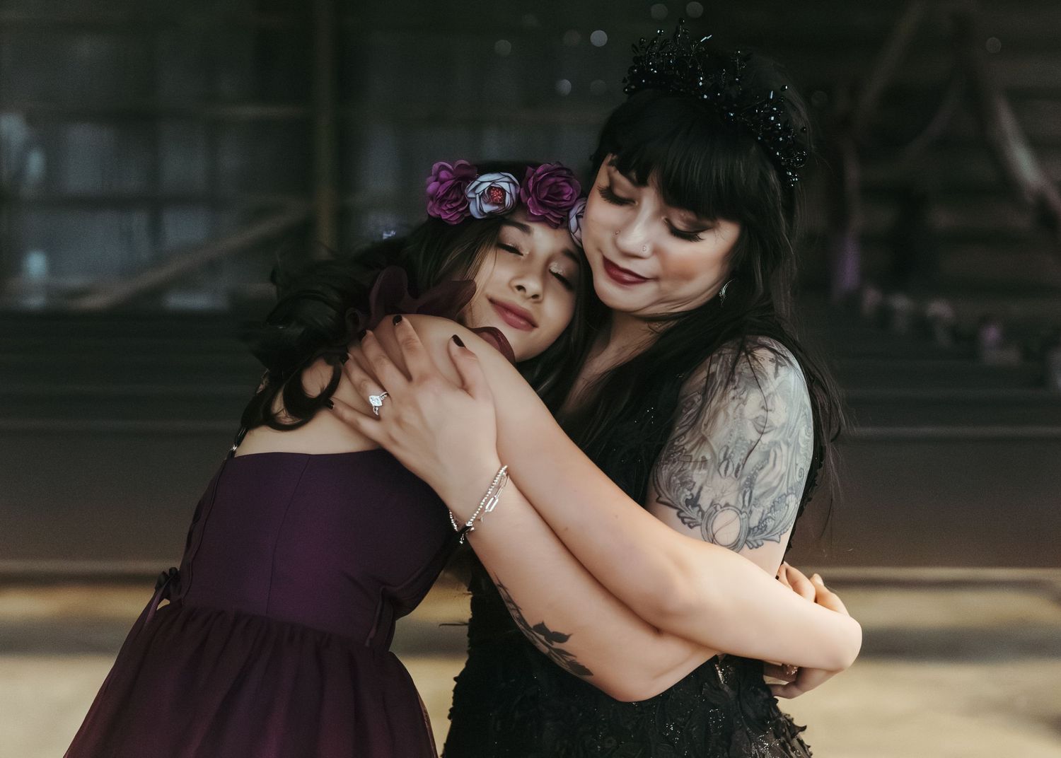 Mother and daughter embracing during an outdoor portrait session
