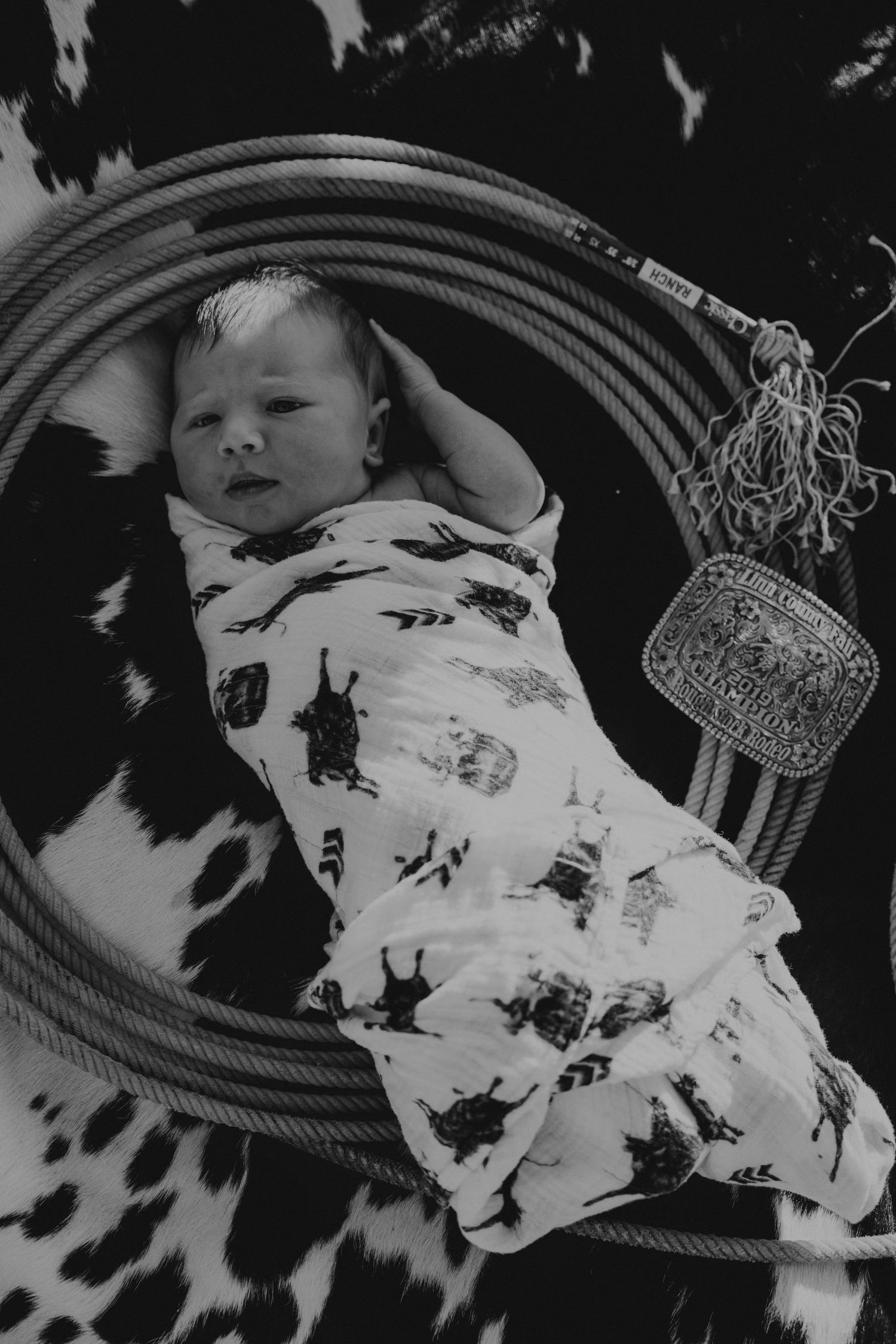Black and white newborn portrait on rustic blanket, Baker City family photography