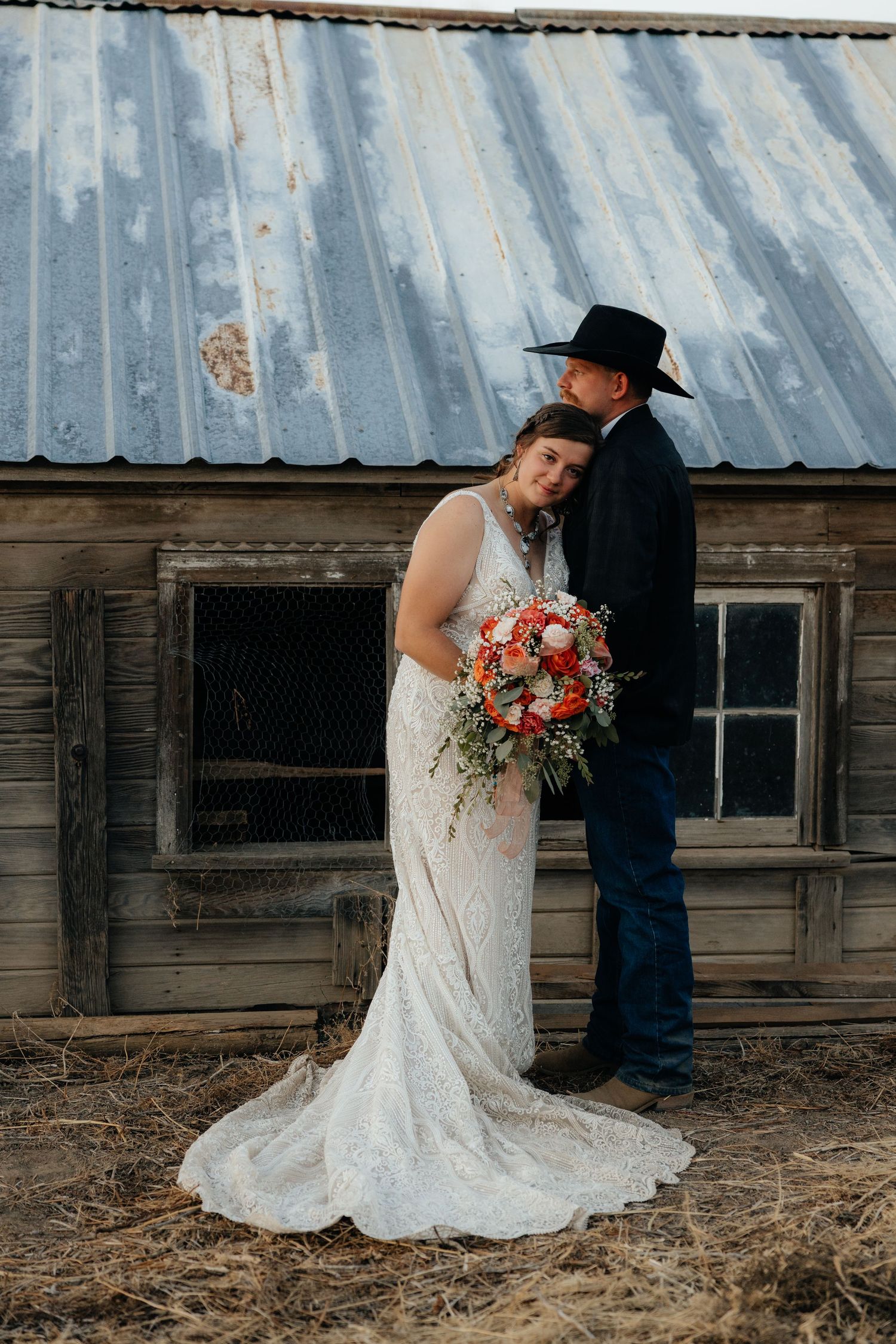 Rustic outdoor wedding portrait in Oregon with bride holding bouquet