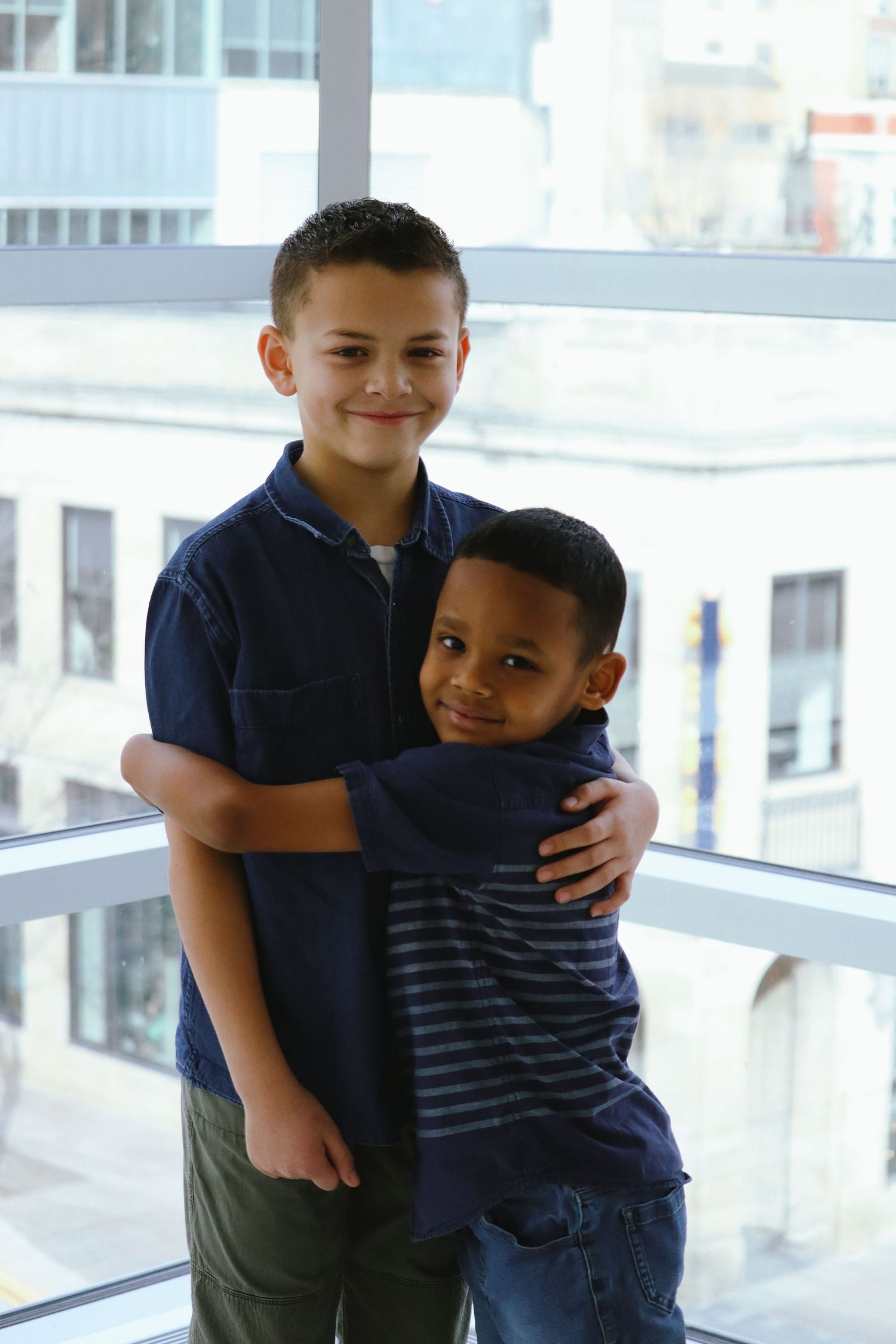 two brothers hugging each other