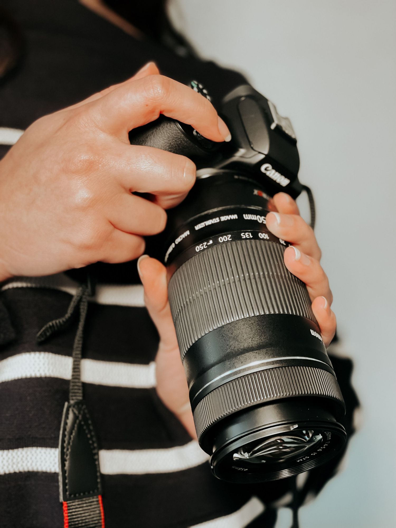 sun prairie photographer, sitting and holding a camera