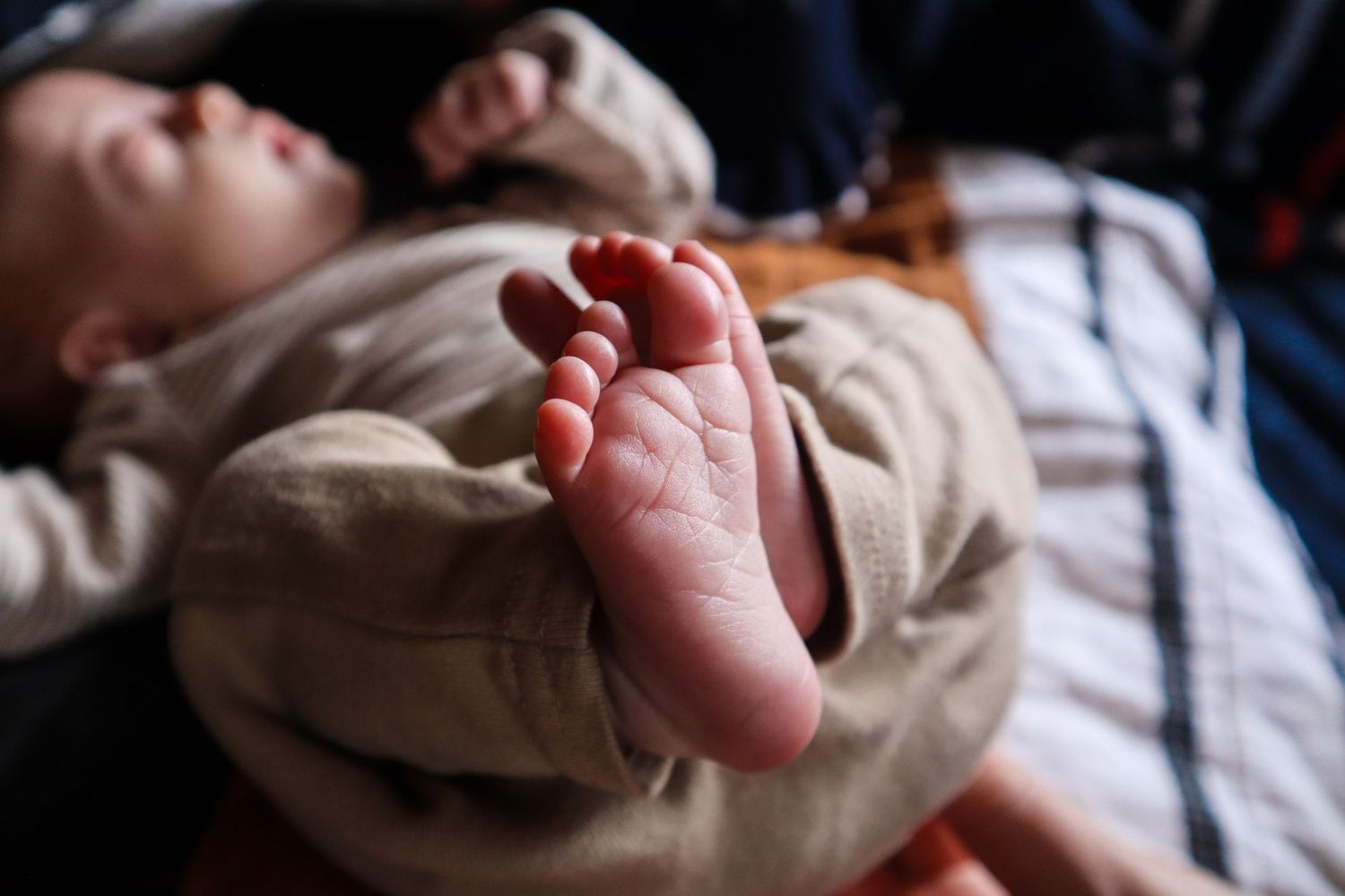 newborn baby boy's feet/foot