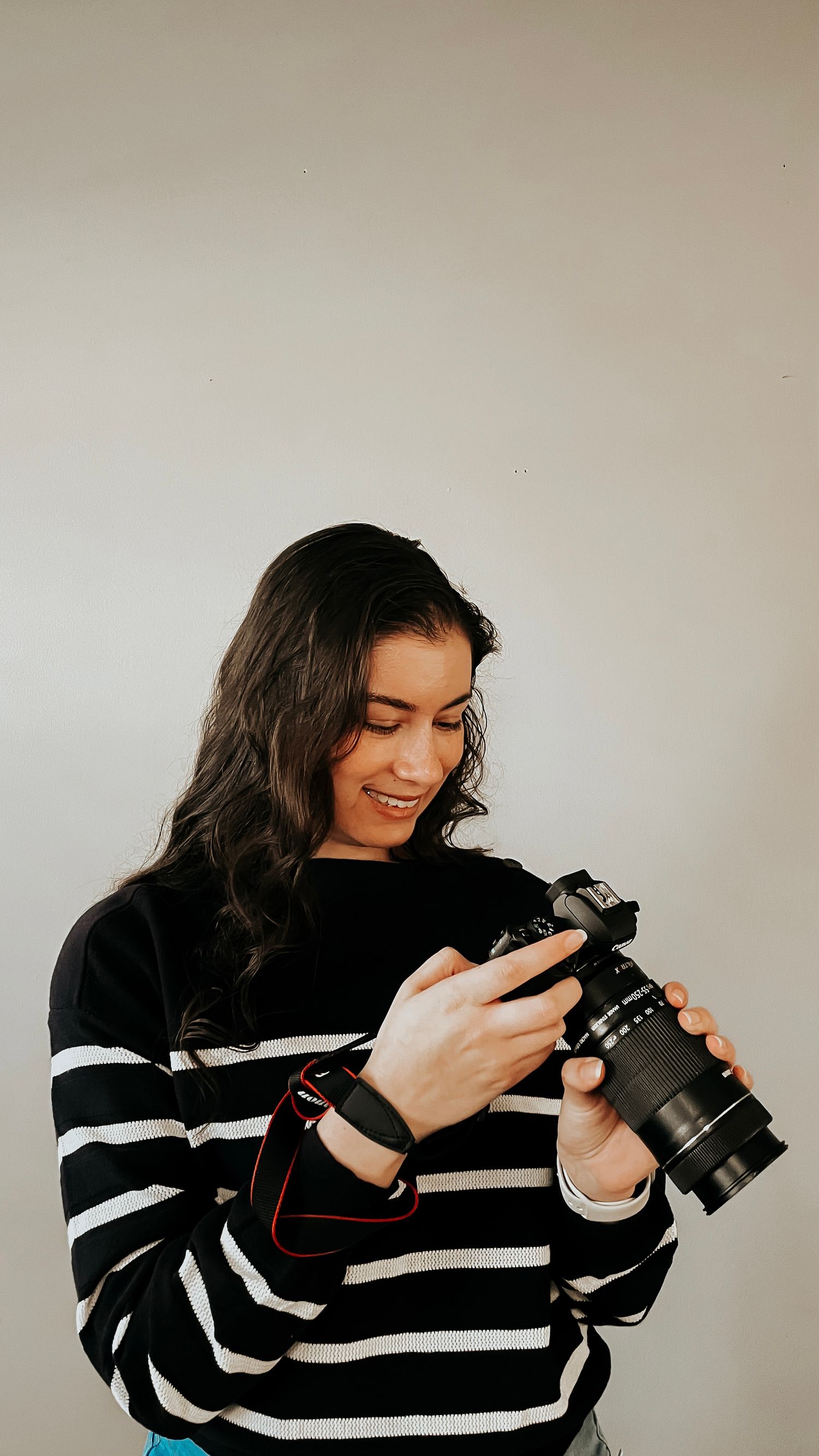 sun prairie photographer, sitting and holding a camera