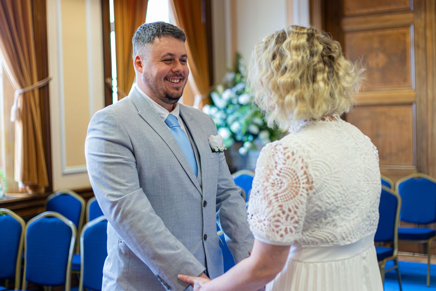 Bride and groom sharing a moment during their wedding at Barnsley Town Hall