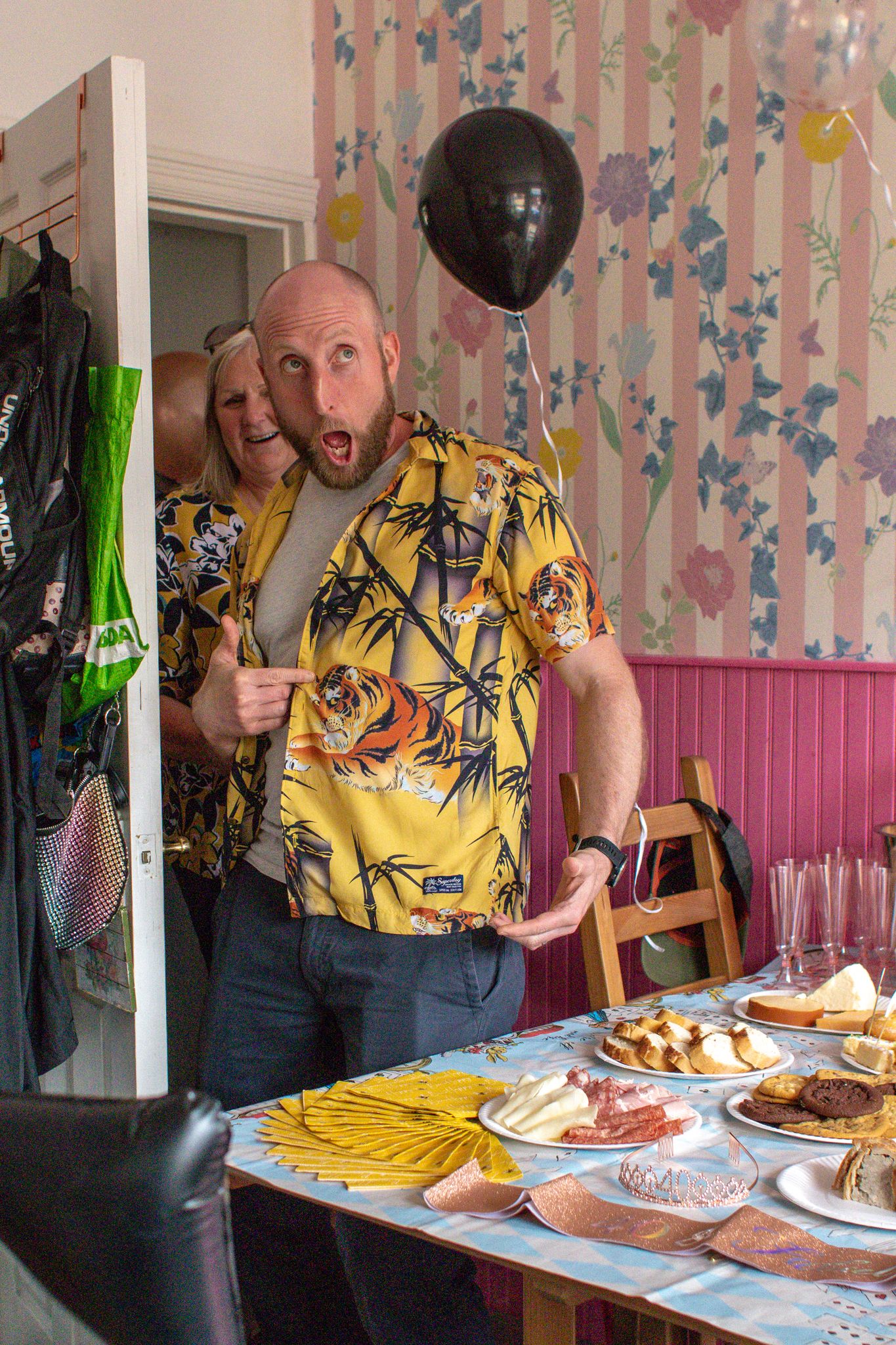 Man exited and being silly at a Birthday Party