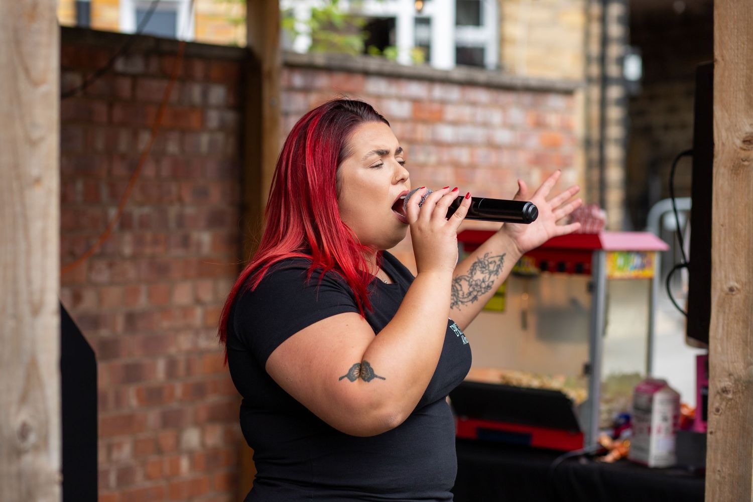 Performer singing at a public event