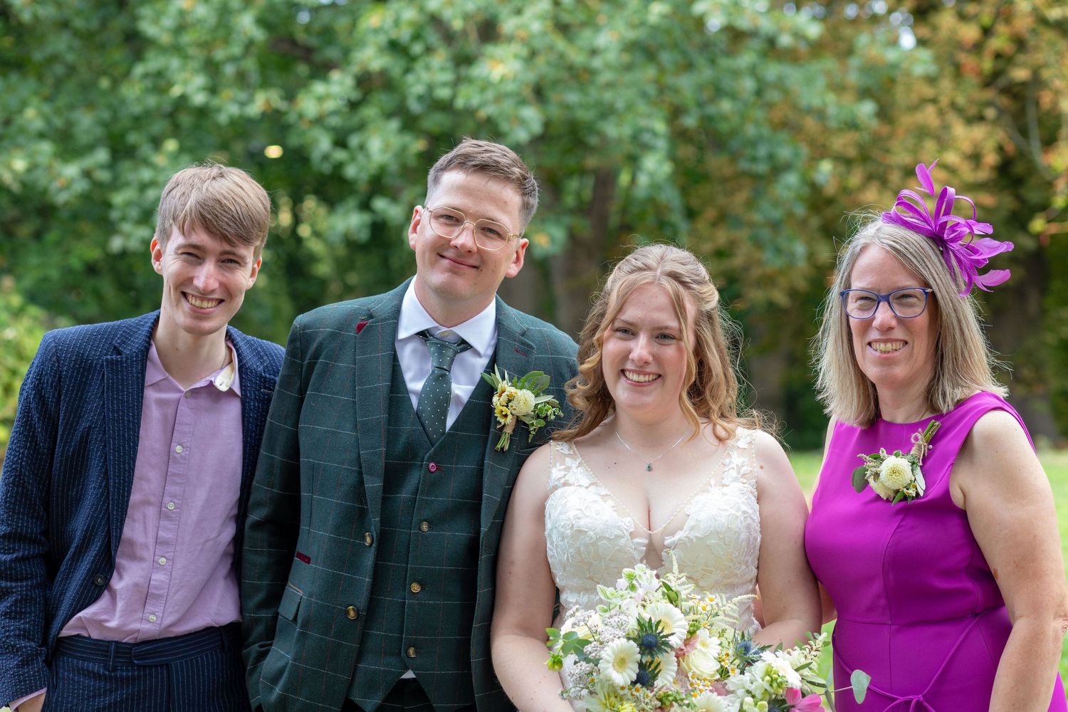 Wedding party photographed together at Elkington Church