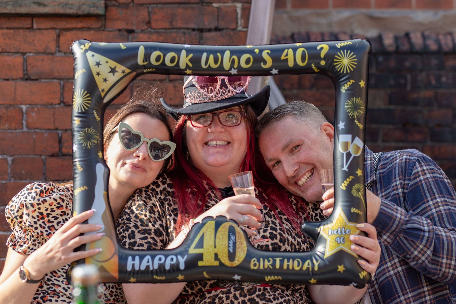 Friends posing together during 40th birthday celebration in Barnsley