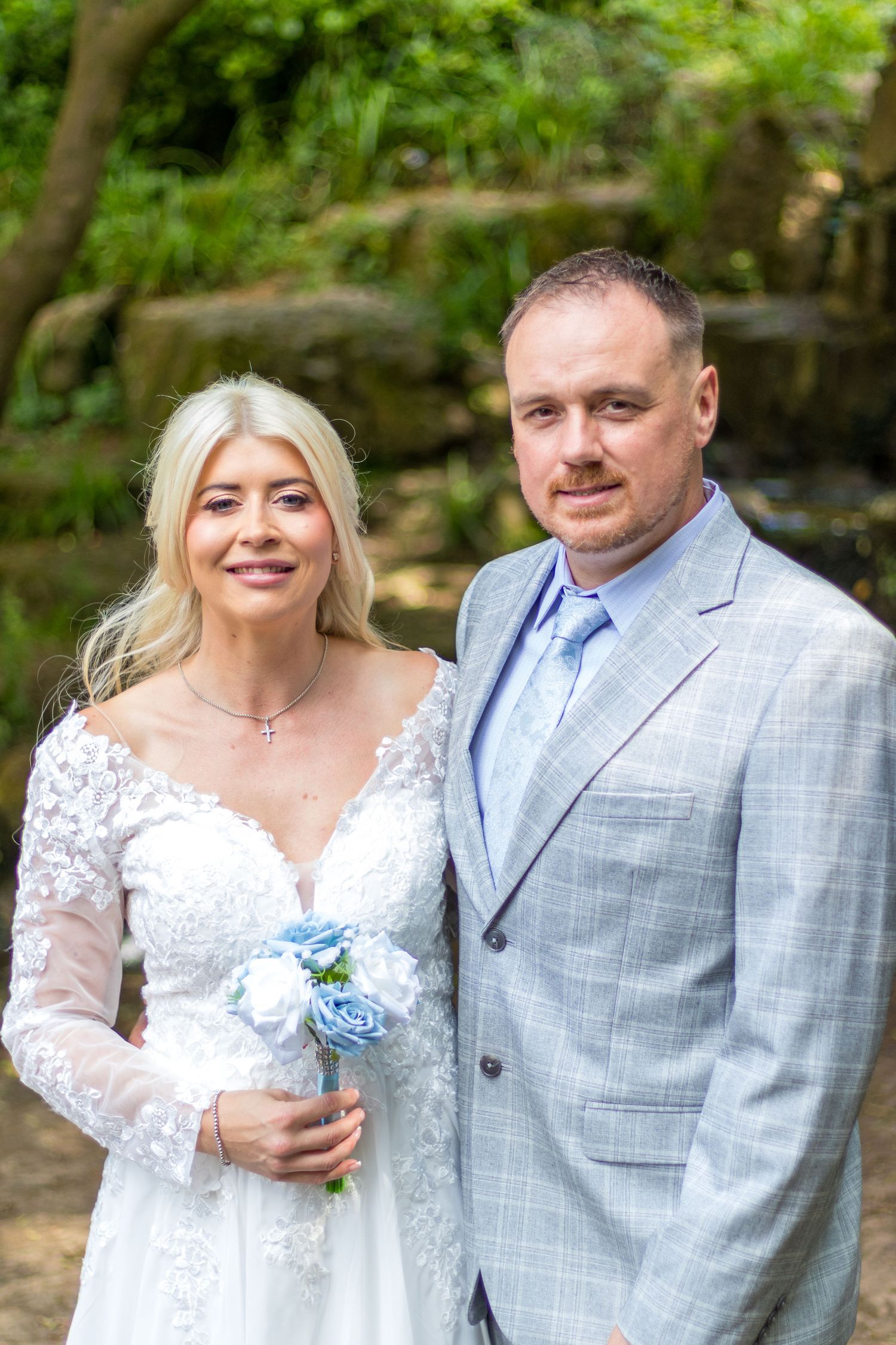 Couple posing for Wedding portrait outdoors