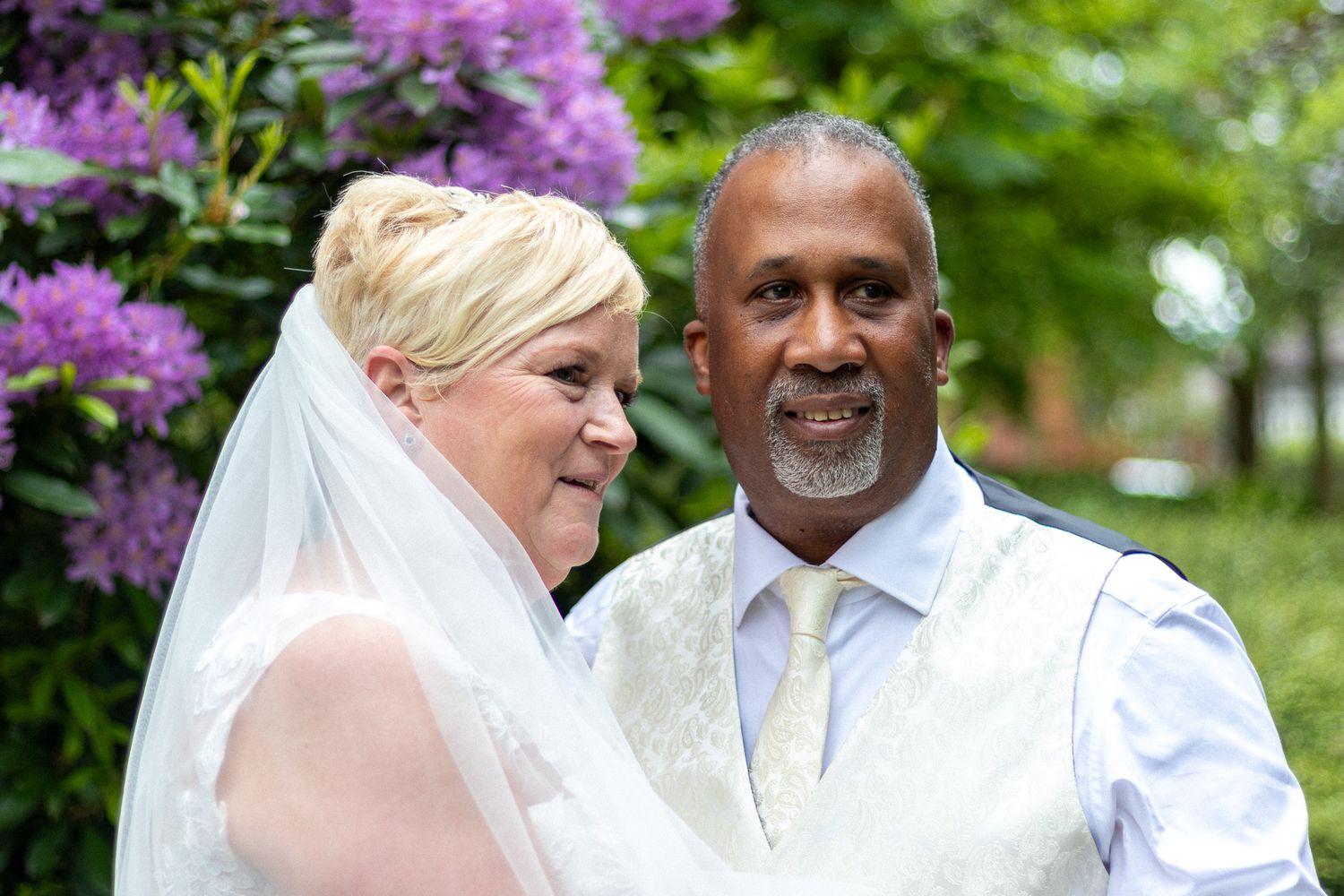 Bridge and Groom embrace after their wedding