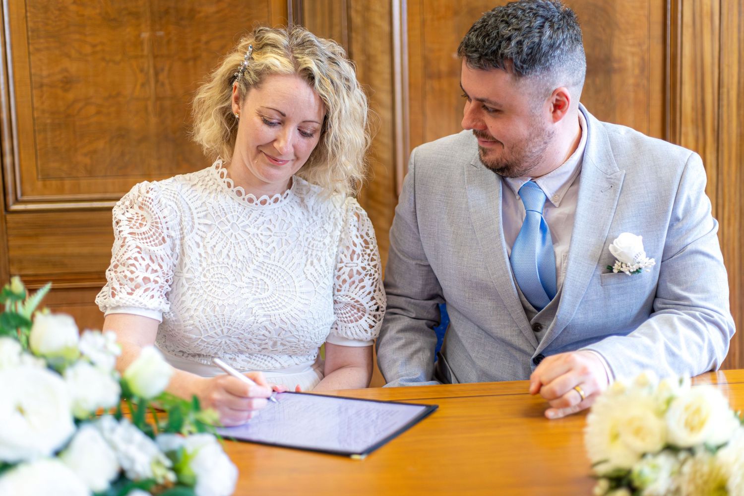 Bride and groom sitting together at Barnsley Town Hall