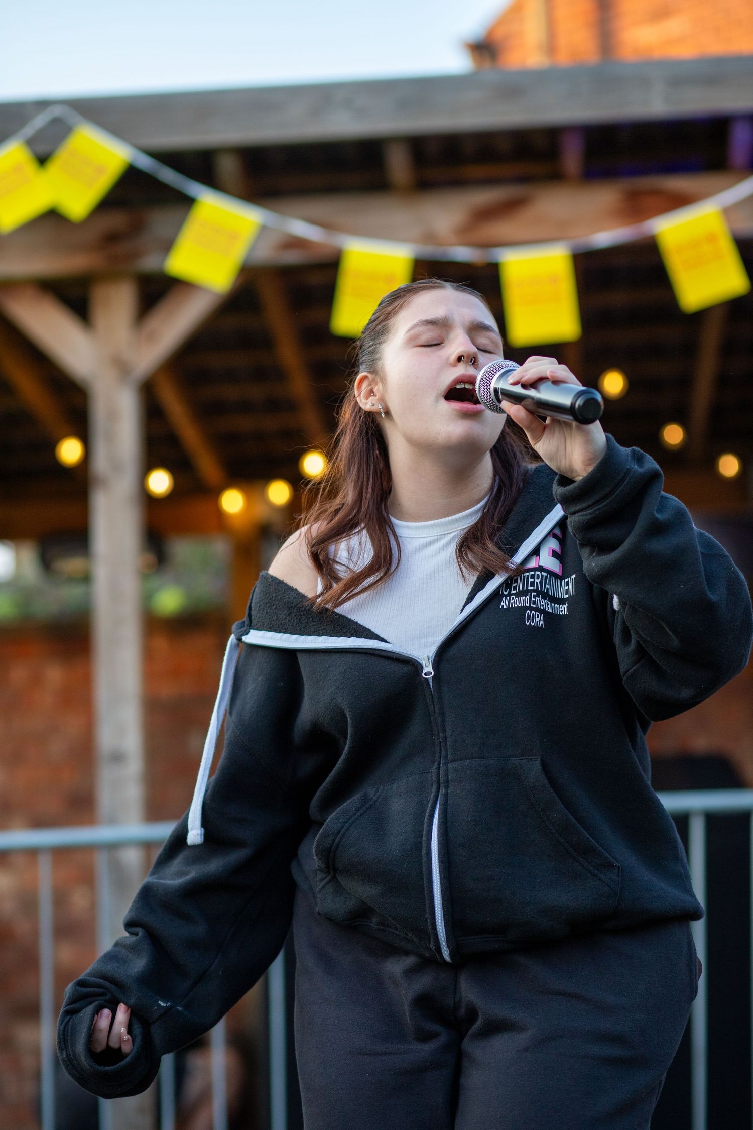 Performer singing at a public event