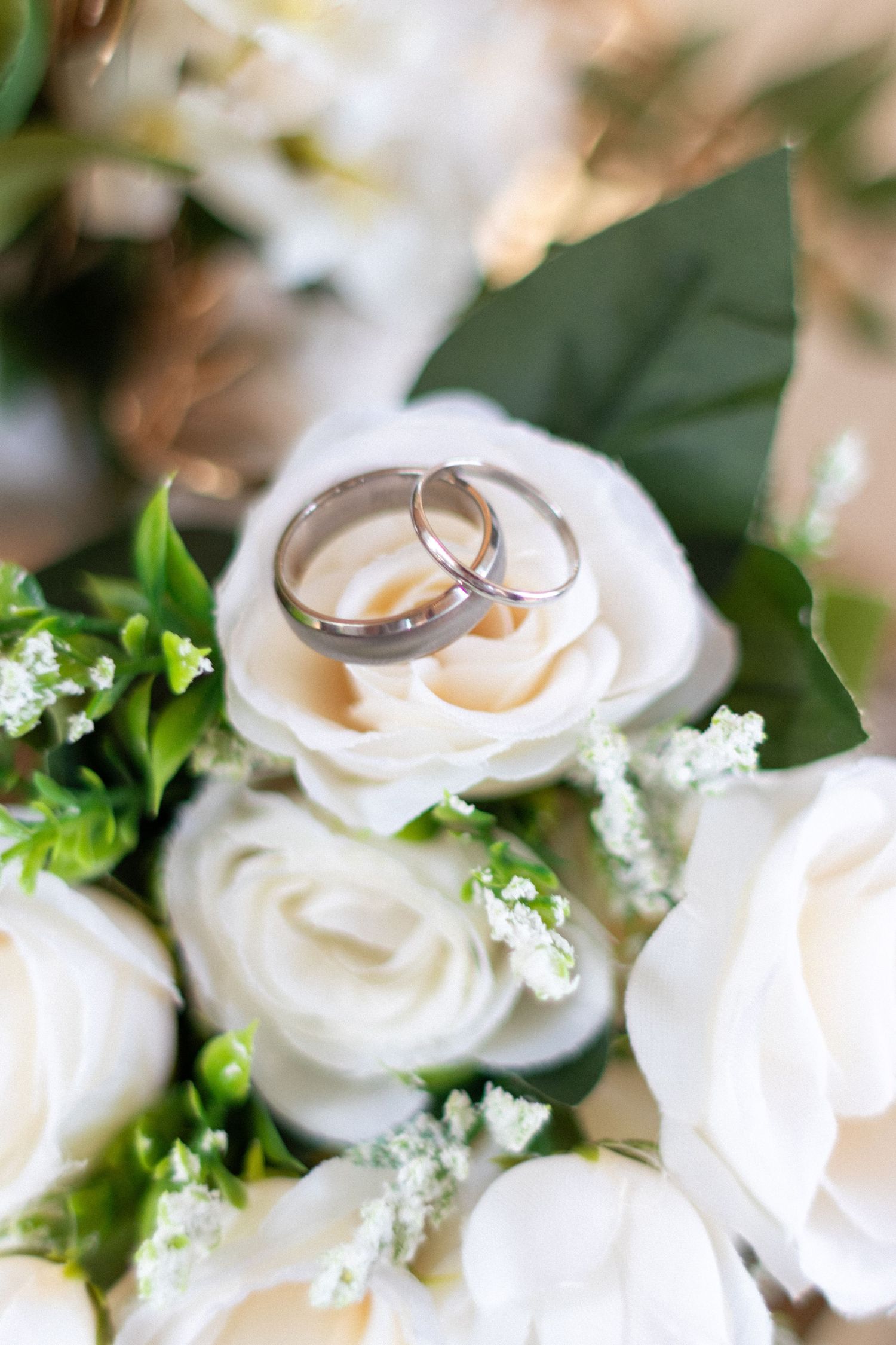 Wedding rings on bouquet