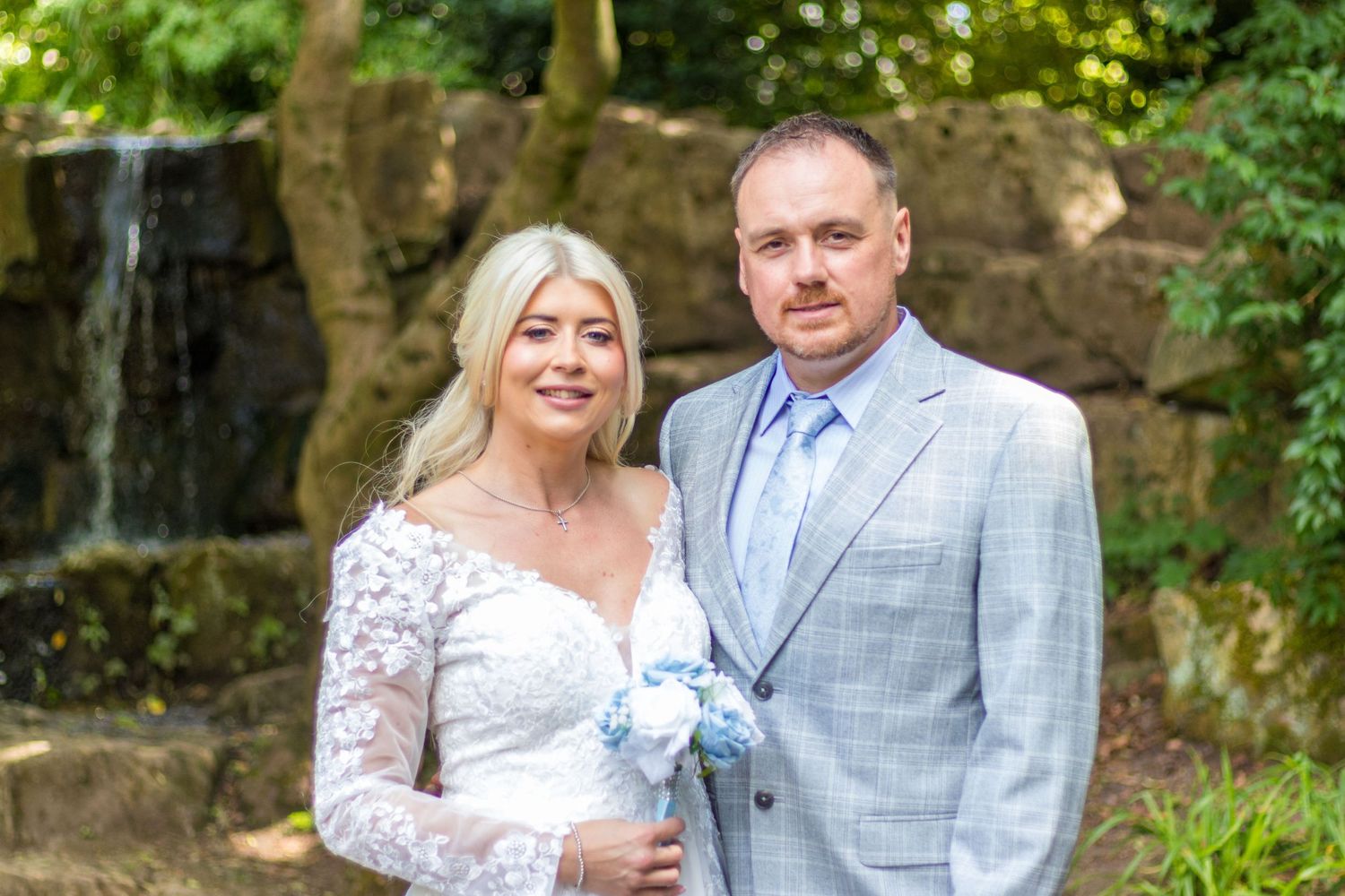 Couple posing for Wedding portrait outdoors