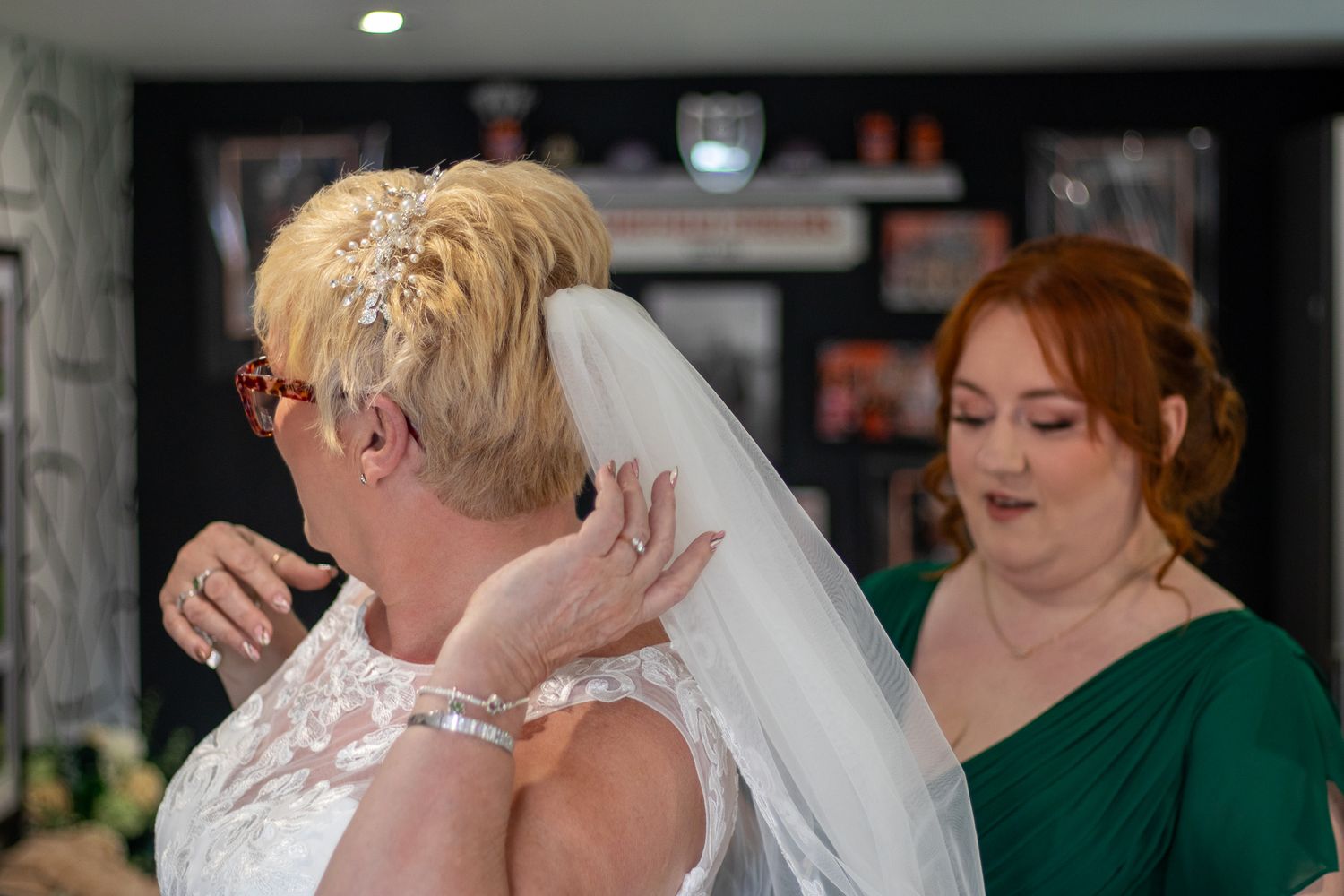 Candid photo of Bride getting ready for wedding at home