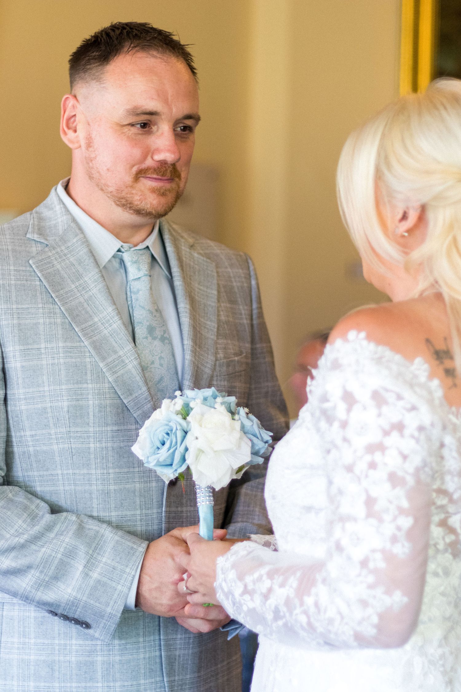 Bride and Groom smiling during their Wedding