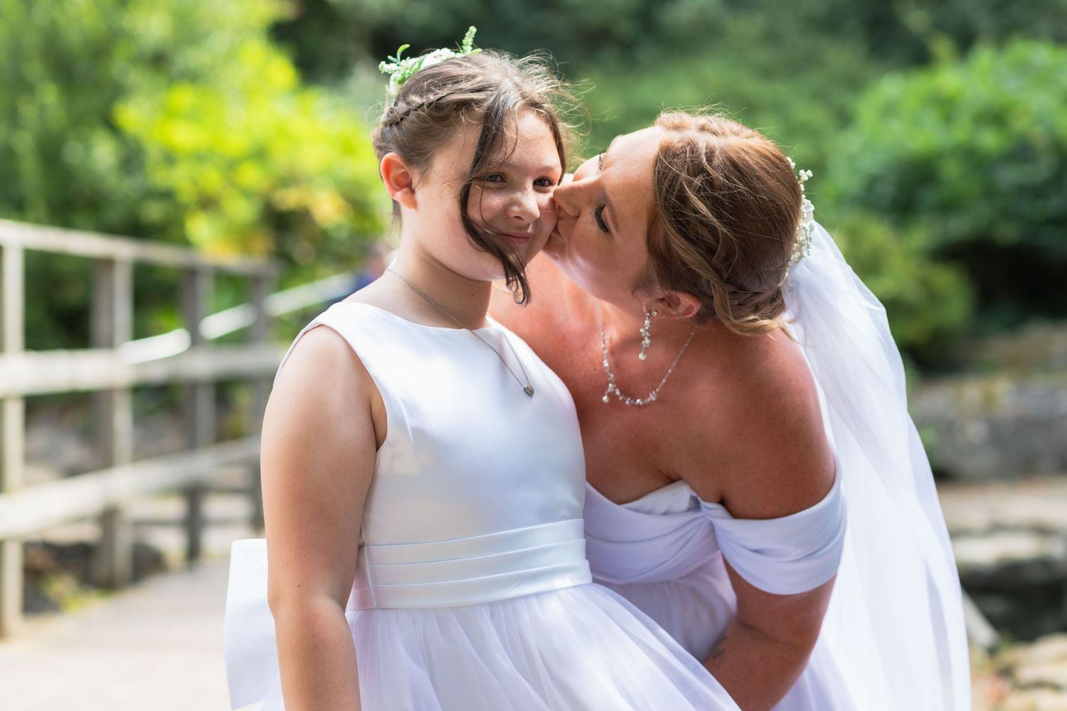 Mother and daughter sharing a moment outdoors at Clifton Park Museum