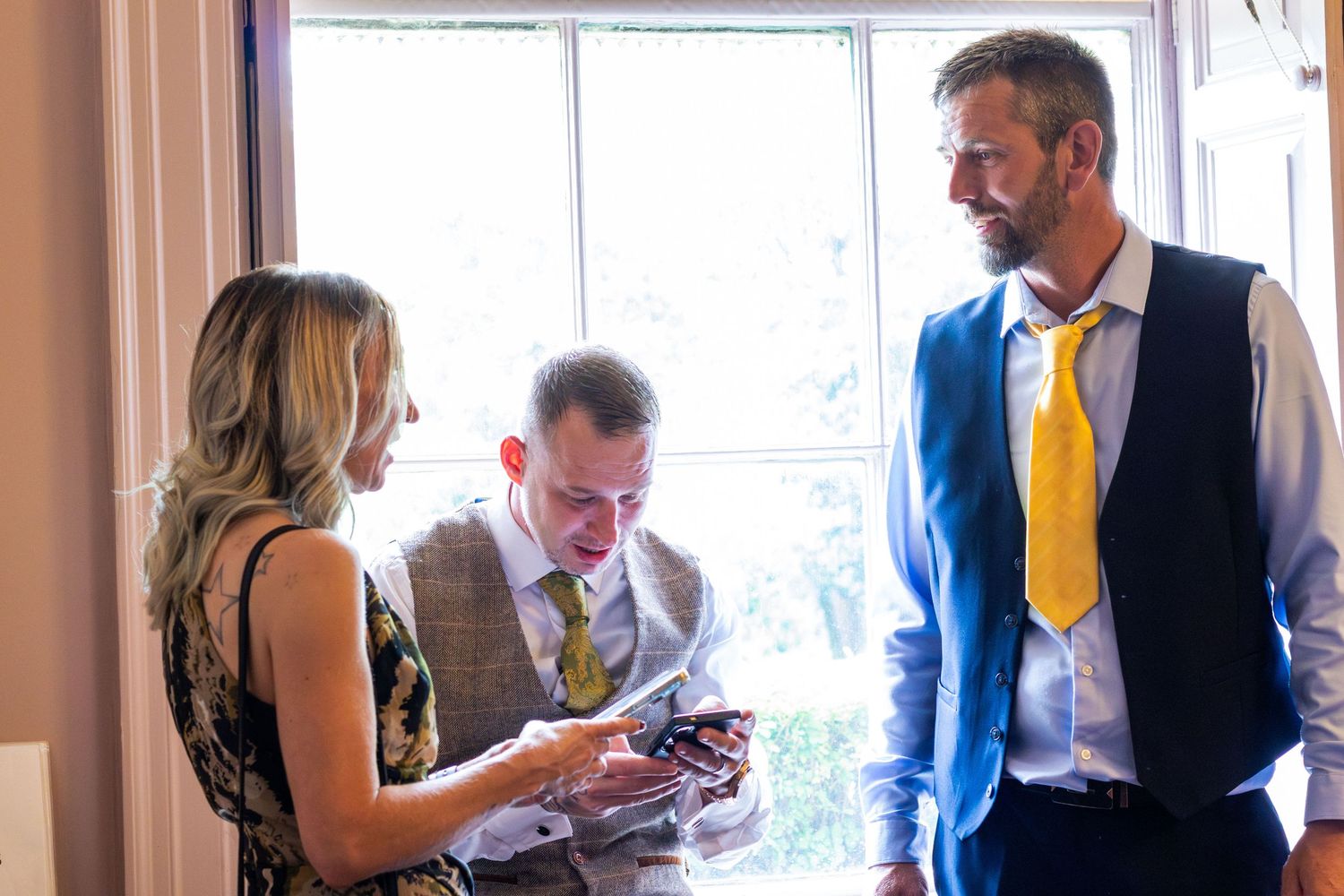 Wedding guests talking together at Clifton Park Museum