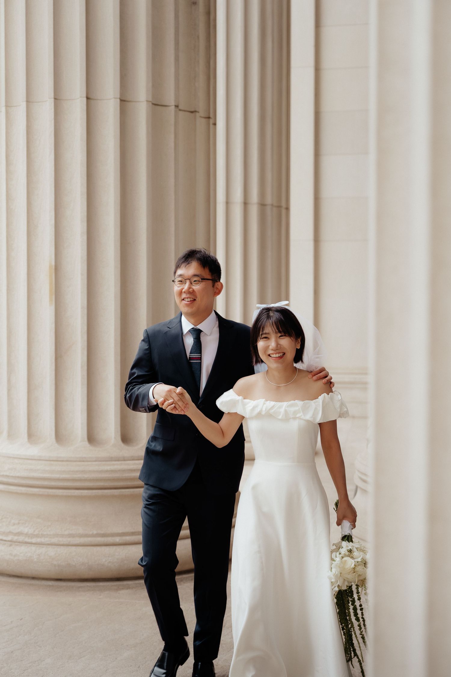 MIT engagement photos at Killian Court with the Great Dome in the background.
