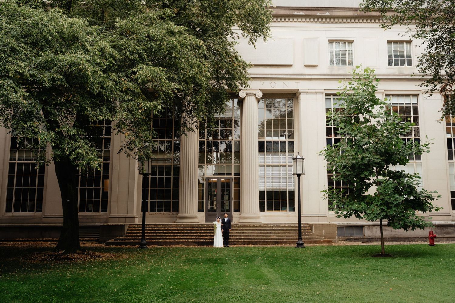 MIT engagement photos at Killian Court with the Great Dome in the background.