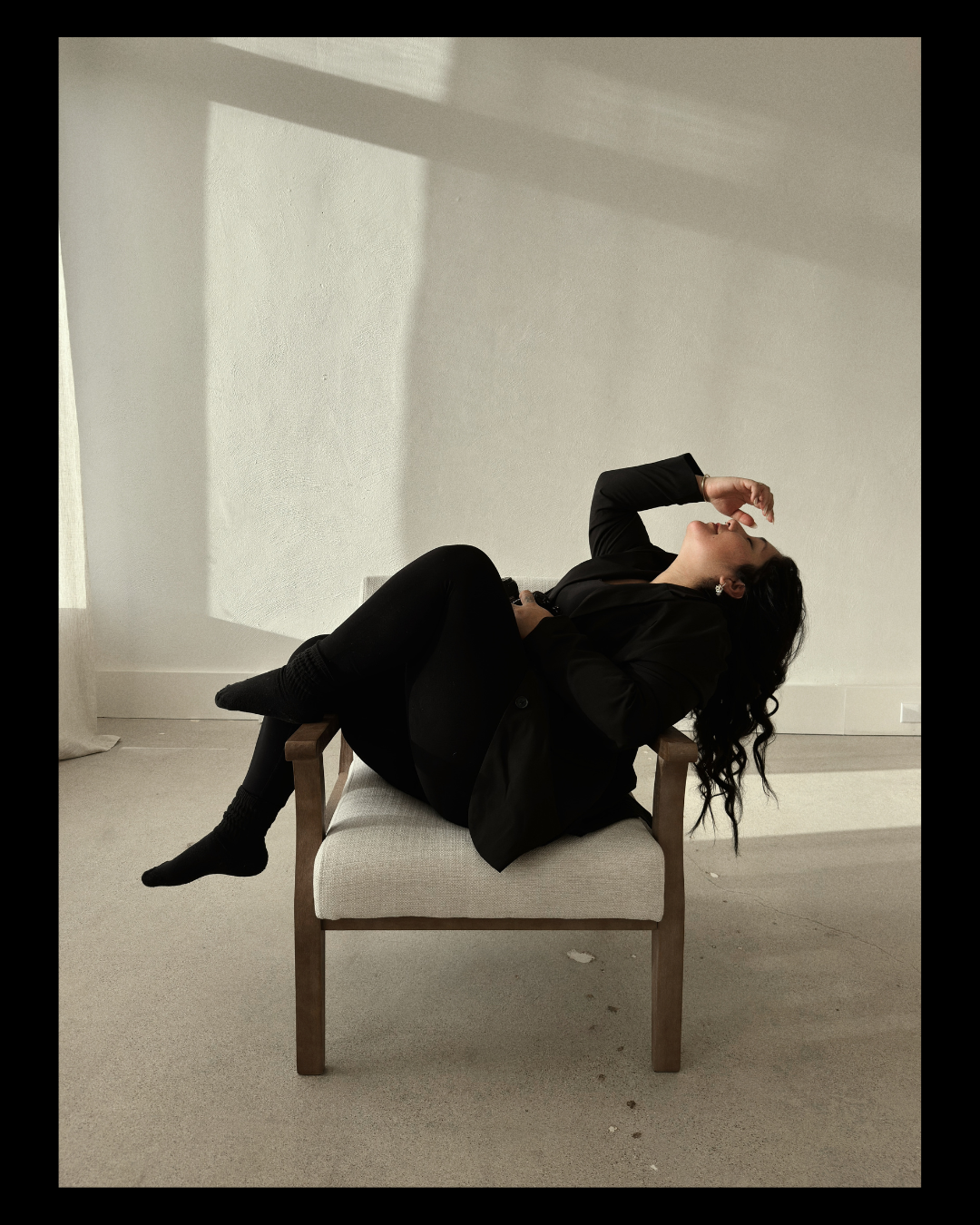 Artistic black and white photo series of person reclining on wooden bench.