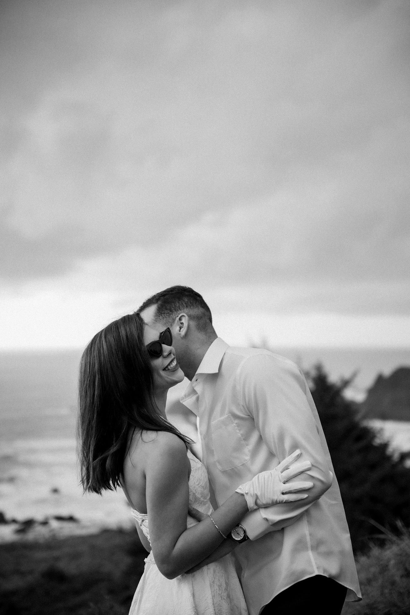 Artistic black and white wedding photography showing intimate moments between a couple.