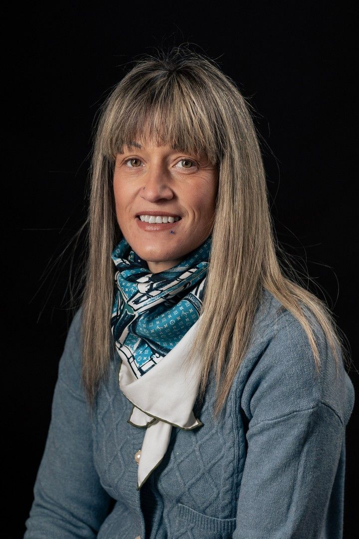 Portrait series of person wearing denim jacket and patterned scarf against dark background.