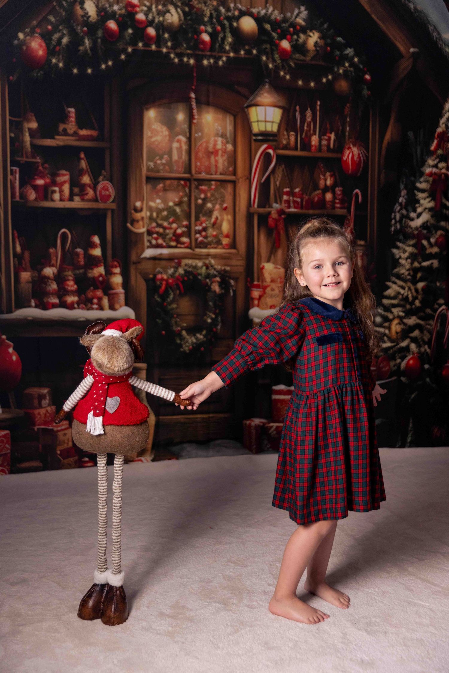 Vintage-style Christmas scene with decorated tree and holiday decor in warm lighting.