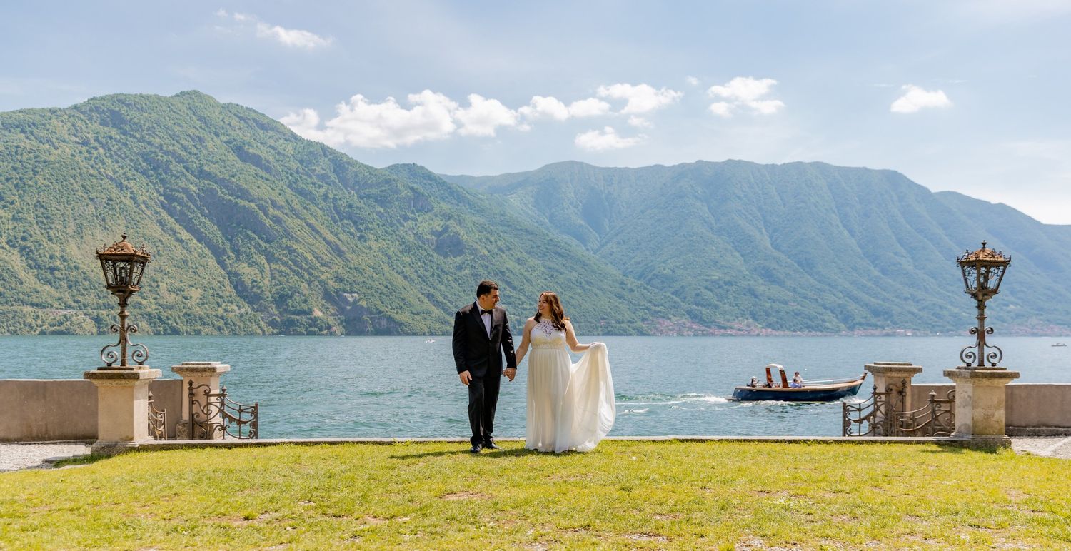 Scenic mountain landscape with stone balustrade overlooking Lake Como in Italy.