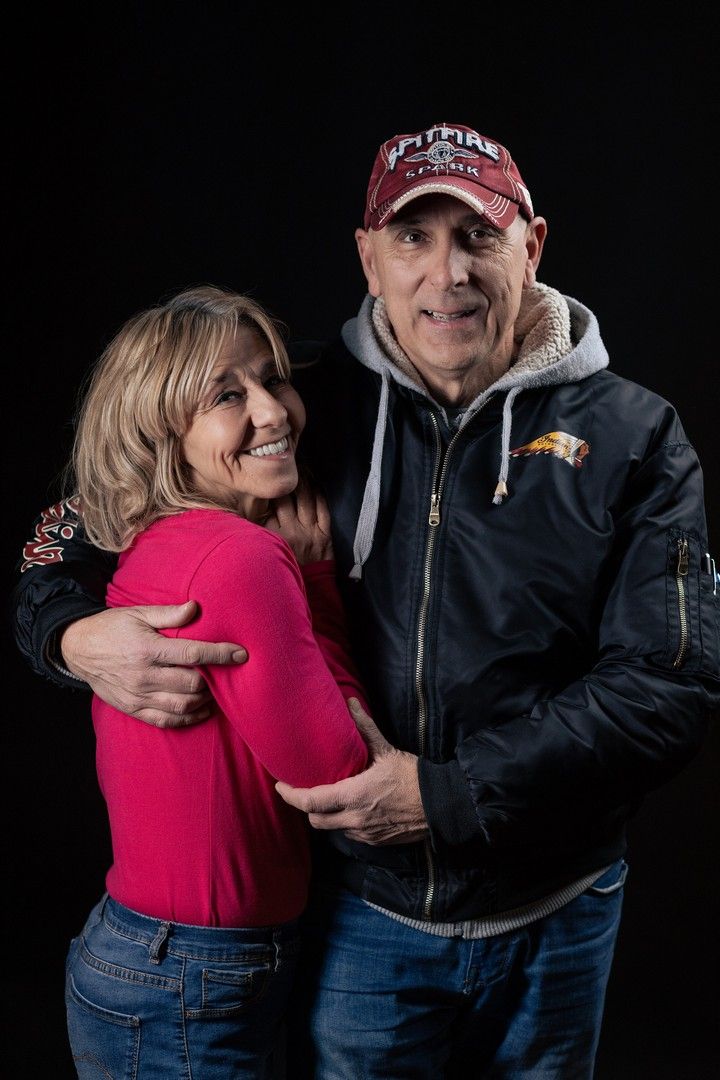 Candid shots of two people embracing, one wearing pink and one in black jacket.