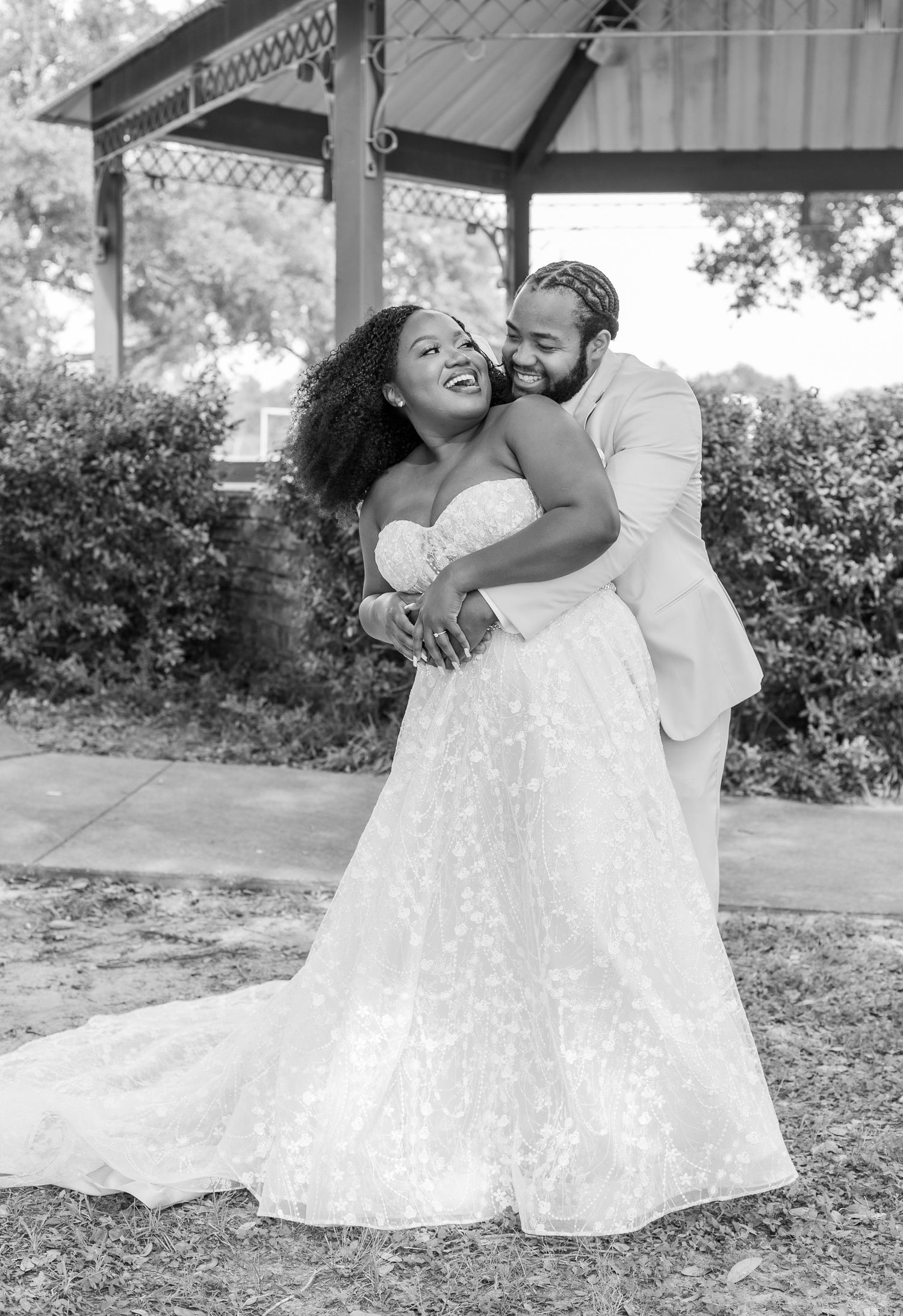 A black and white wedding photography series showing tender moments between newlyweds.