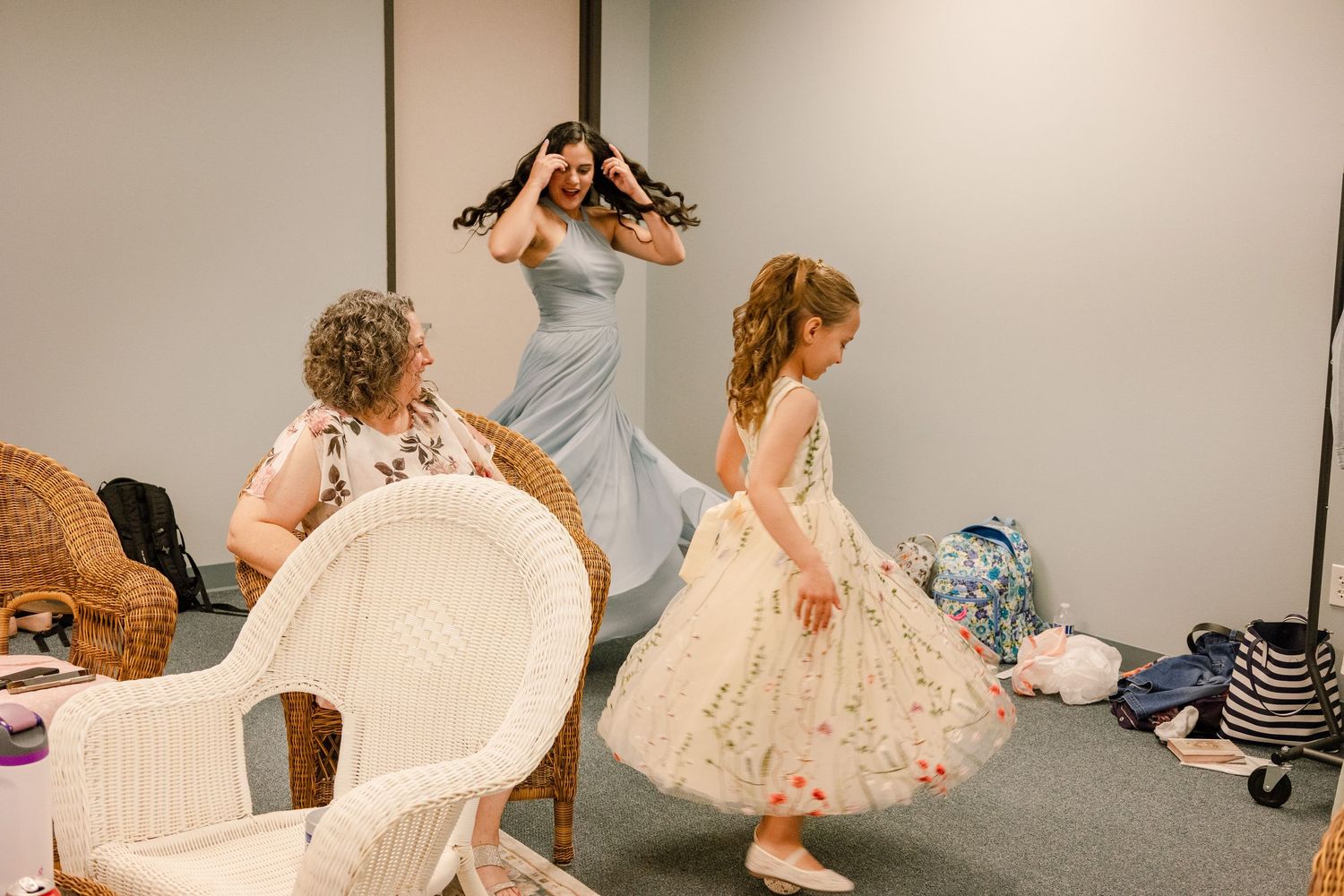 Wedding preparations and candid moments captured in a bridal suite setting.