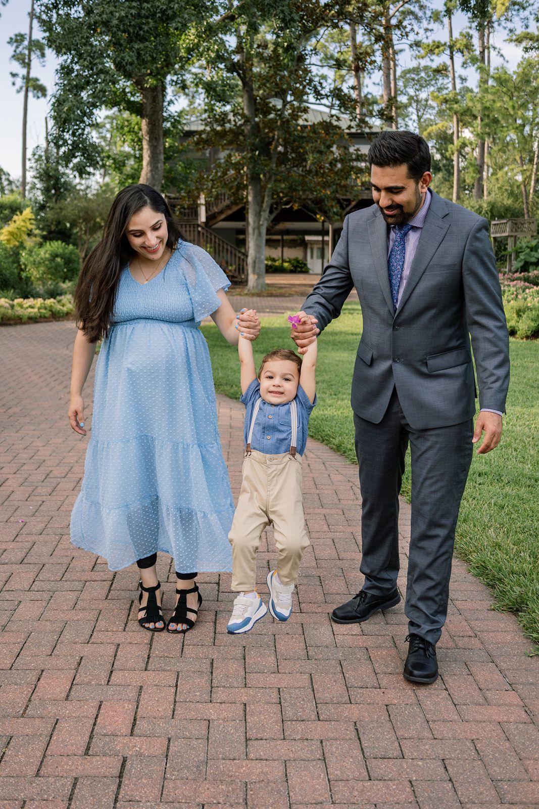A series of five photos showing feet and legs of people in blue dress and suit standing on brick pavement outdoors.