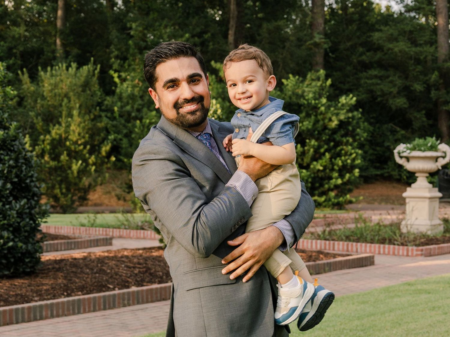 A series of candid outdoor photos showing joyful moments between a parent and child in a garden setting.