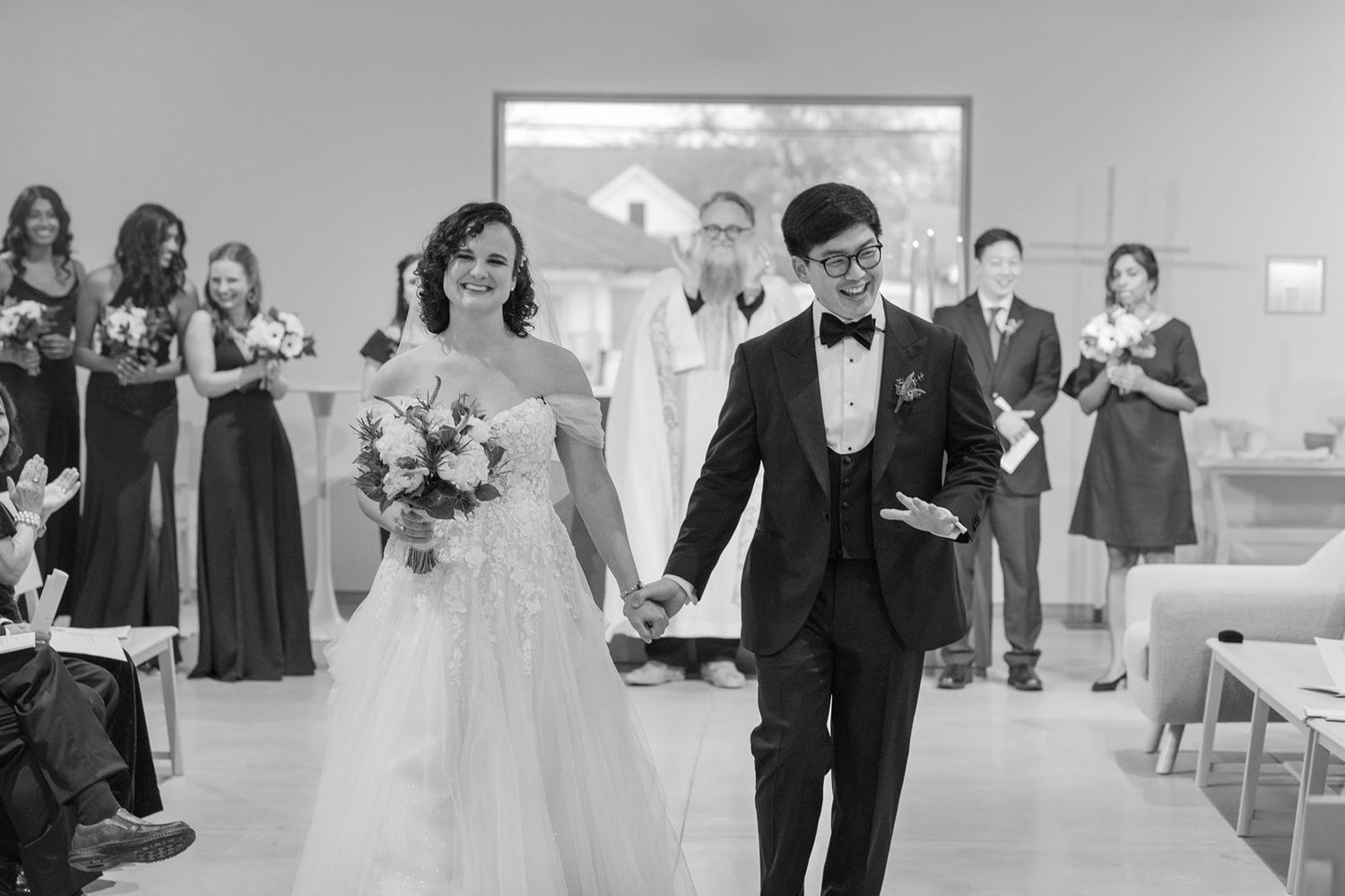 Black and white wedding photography sequence showing couples dancing and celebrating during a reception.