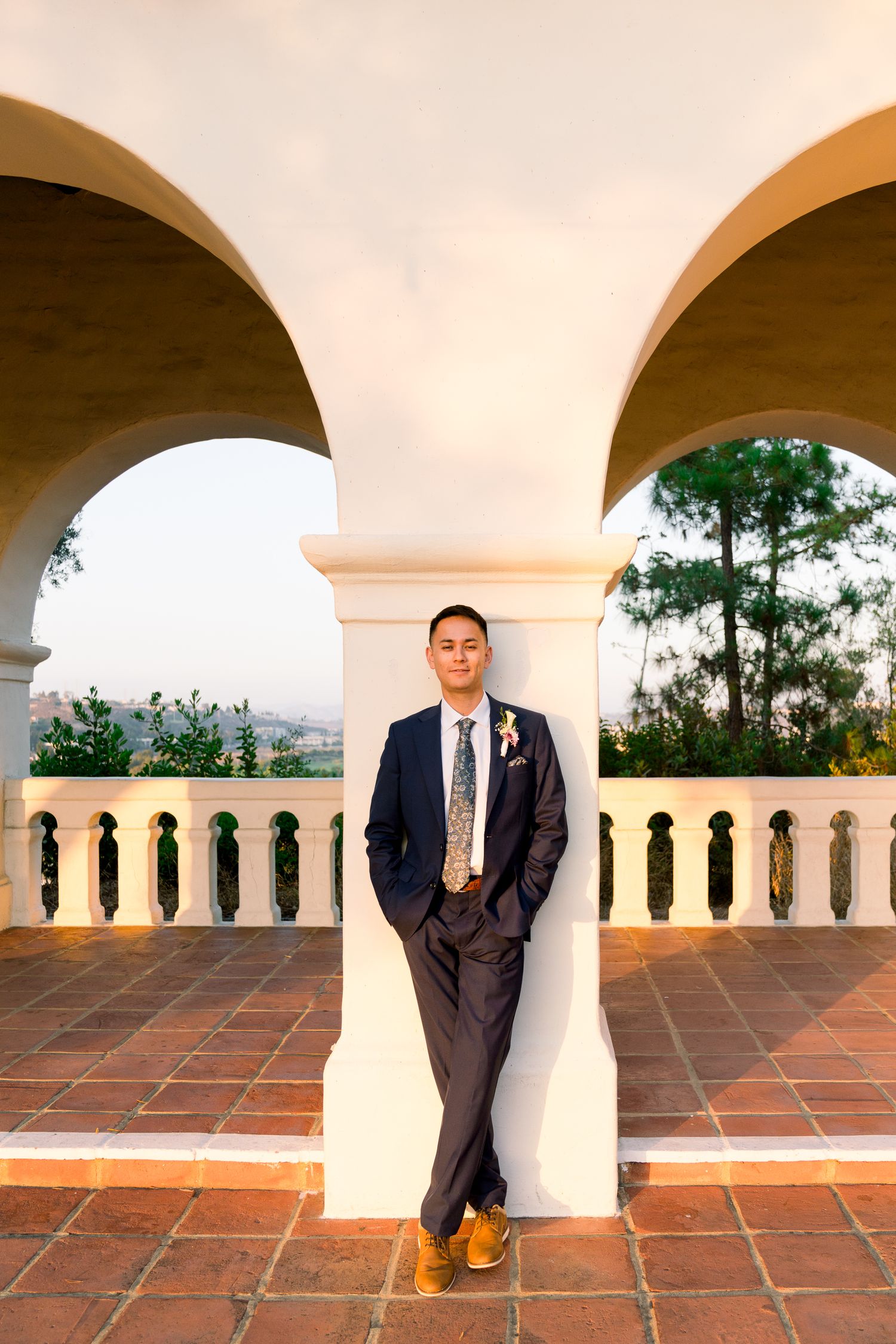 Couple Kissing or Engagement Photos at Junipero SErra Museum with Spanish architecture