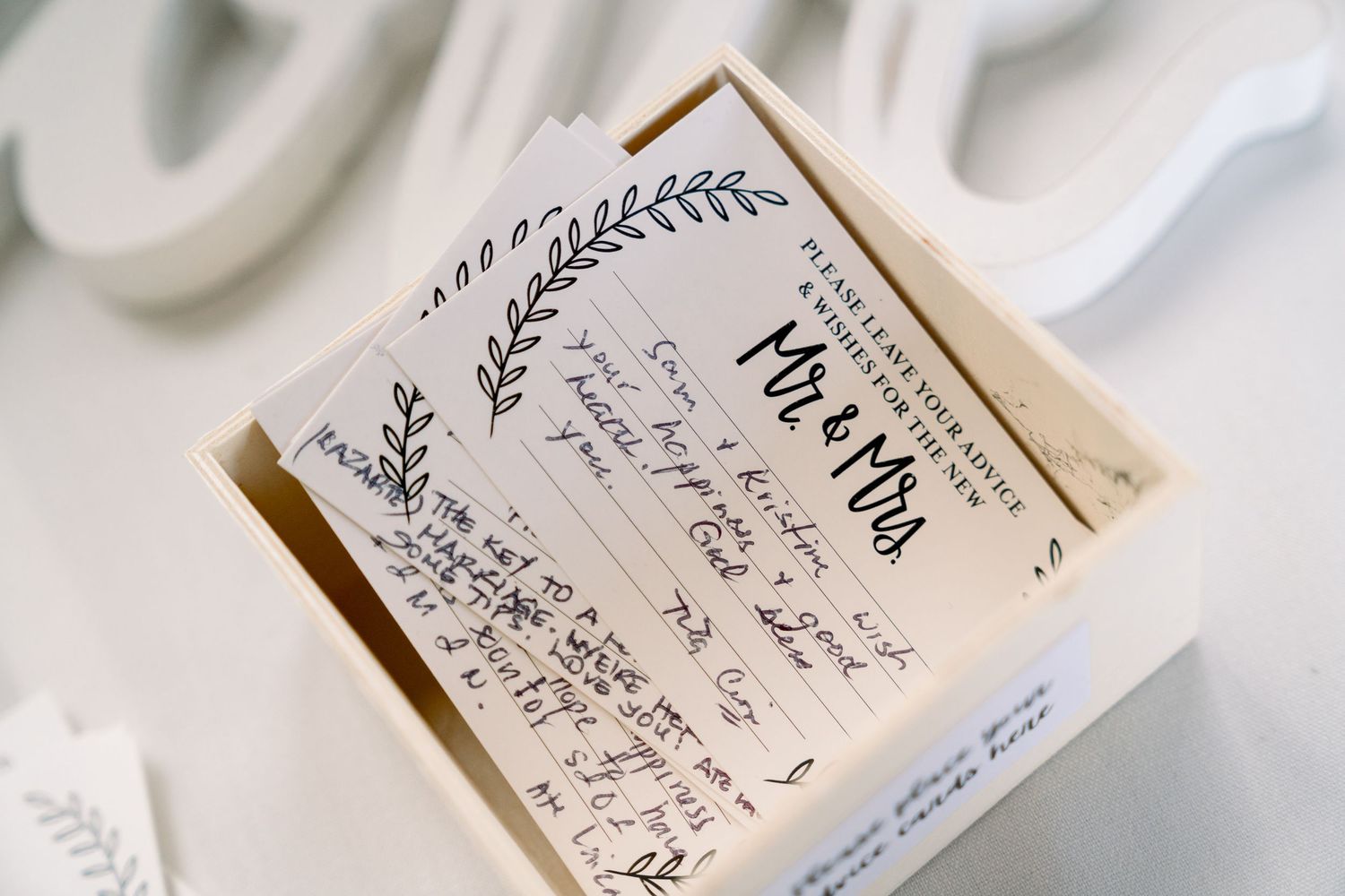 Vintage wedding invitation with delicate floral design and handwritten details.