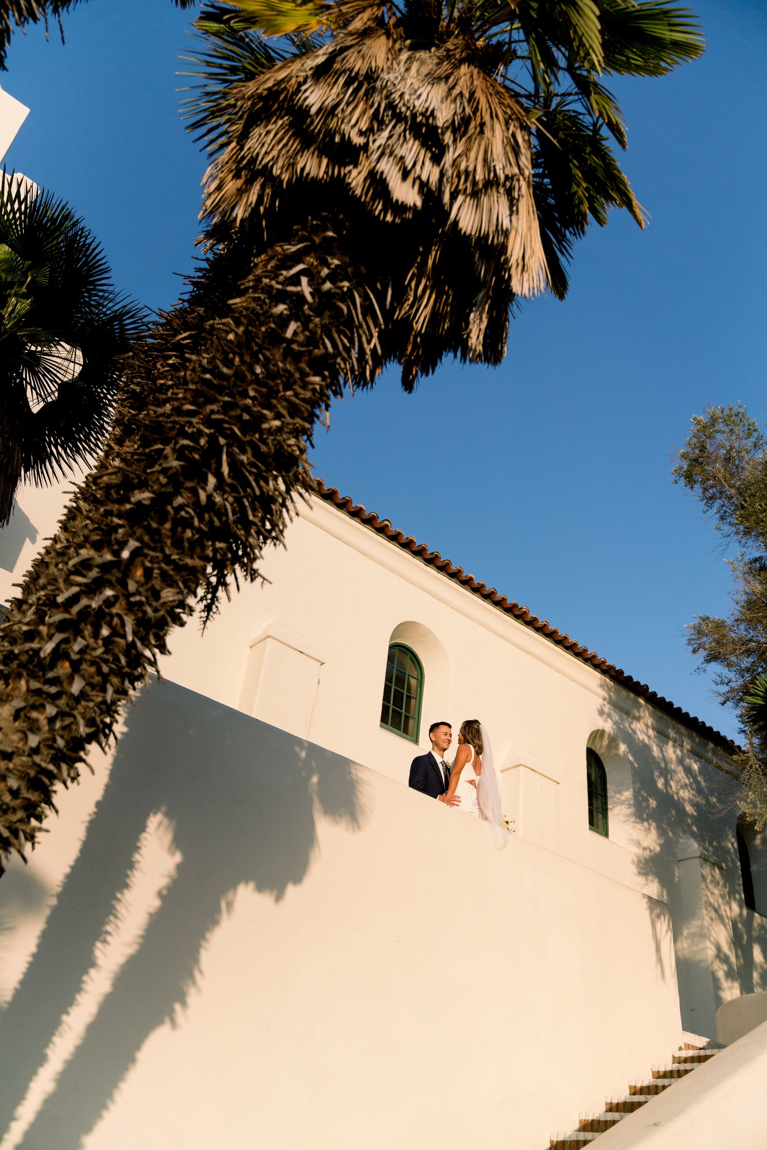 Engagement portraits at The Junipero Serra Museum with a San Diego wedding photographer Unique Engagement Photography