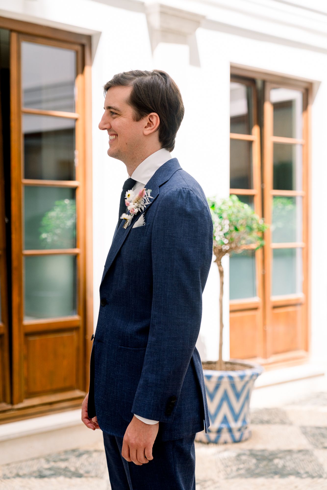 First look in a beautiful hotel in Spain, captured by a San Diego wedding photographer.