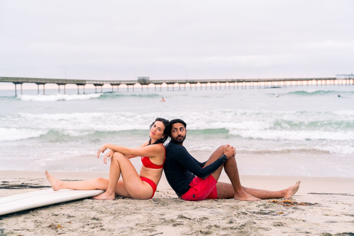 Engagement photos at the beach with a San Diego wedding photographer - at ocean beach
